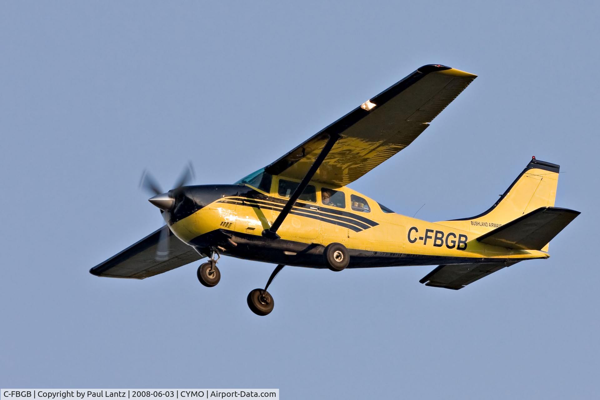 C-FBGB, 1970 Cessna U206E Skywagon C/N U20601514, Bushland Airways Cessna 206 above the Moose River at Moosonee, Ontario