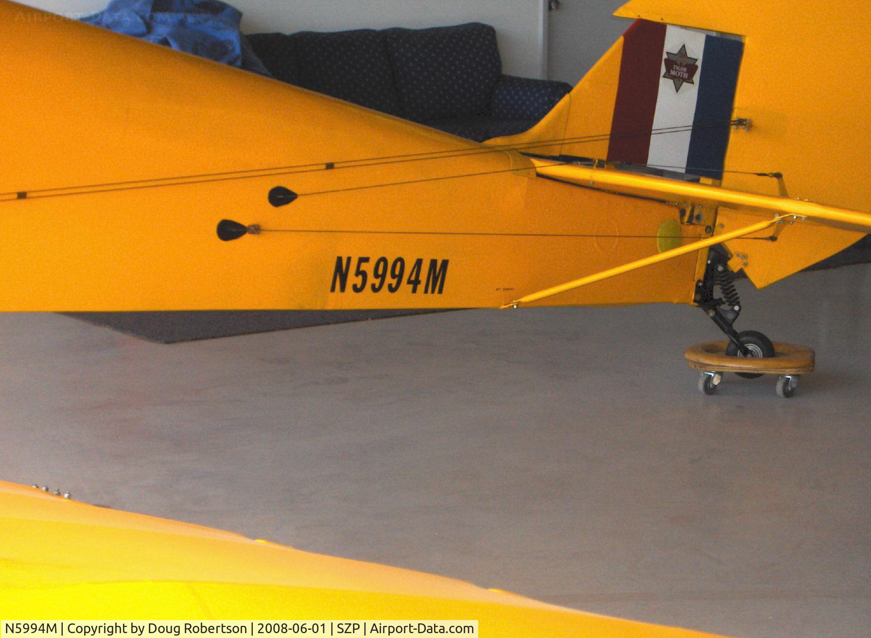 N5994M, 1942 De Havilland Canada DH-82C Tiger Moth C/N DHC1297, 1942 DeHavilland DH 82C TIGER MOTH, DH Gipsy Major 1C 142 Hp, tail wheel dolly aids hangar maneuverability