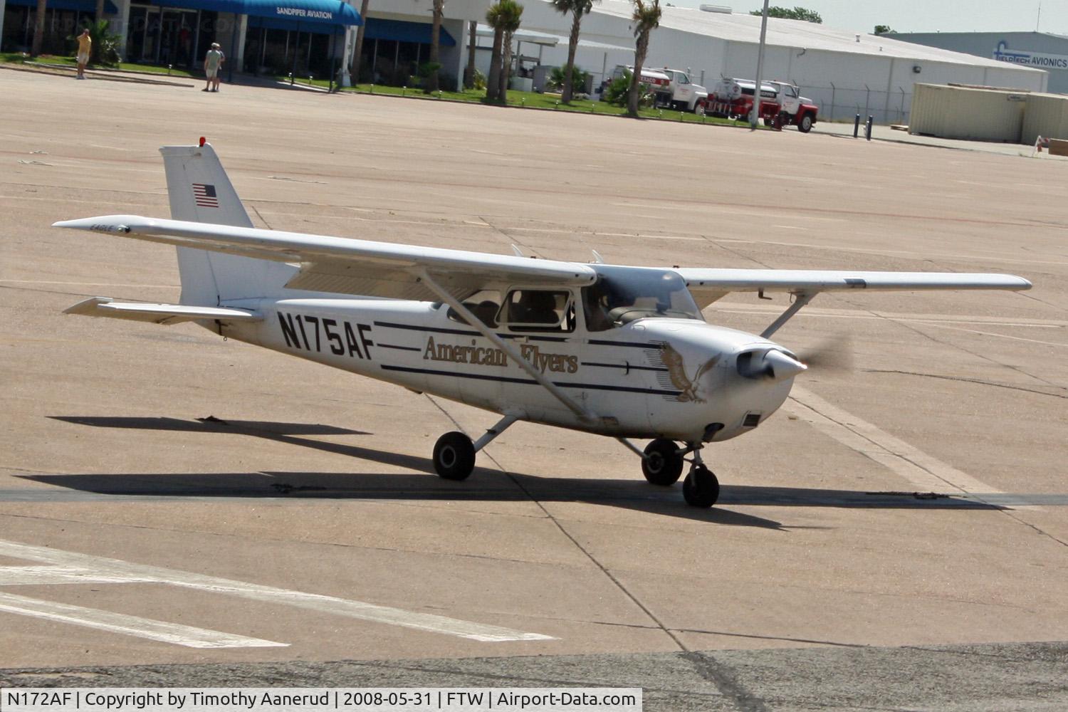 N172AF, 1972 Cessna 172M C/N 17261269, On the ramp at FTW.  Photo taken while riding in a Huey