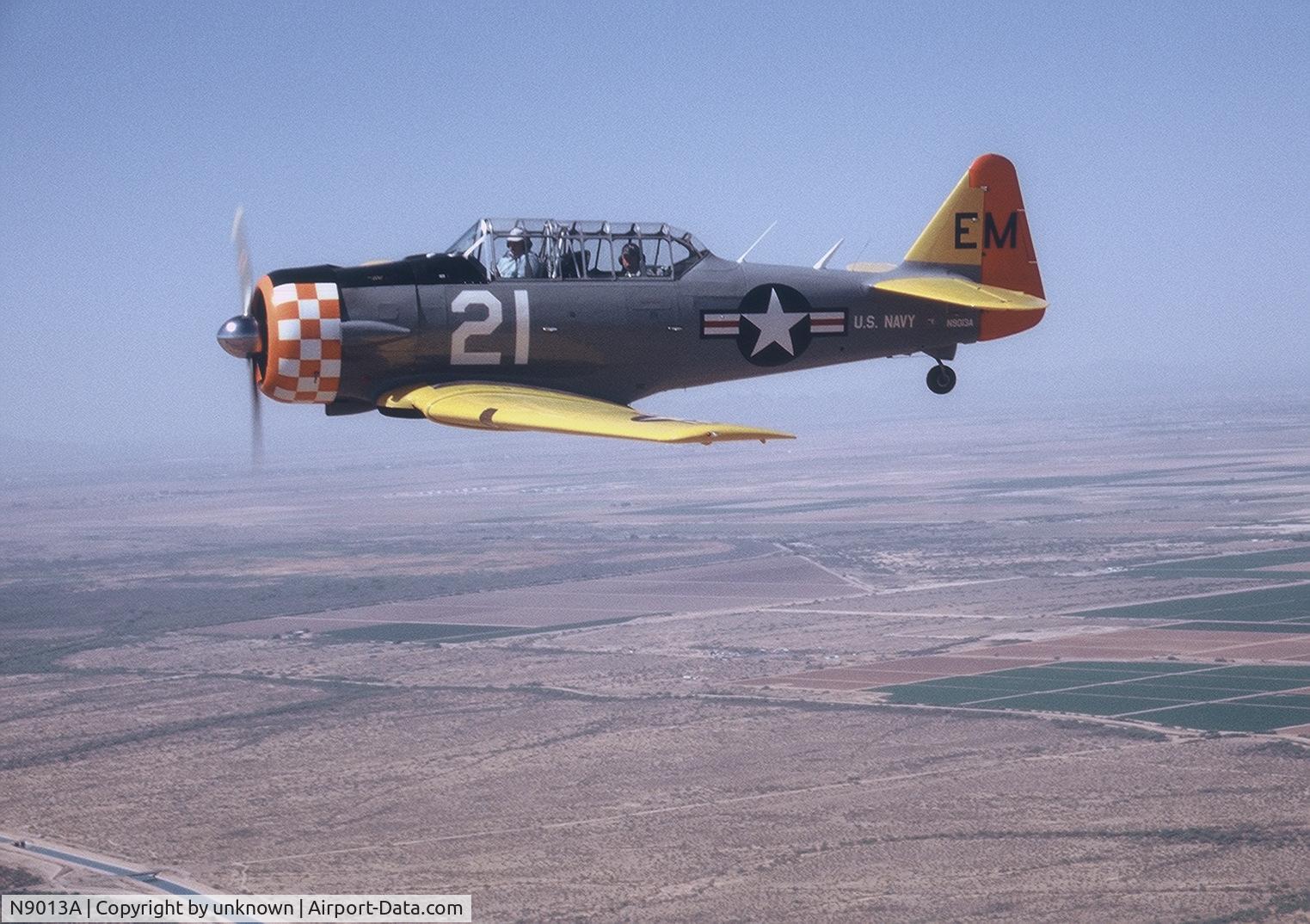 N9013A, 1944 North American SNJ-5 Texan C/N 90868, in flight over Coolidge Az