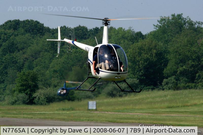 N7765A, 1989 Robinson R22 Beta C/N 1079, R-22s at Ellington, CT. N7765A in front of N322ML.