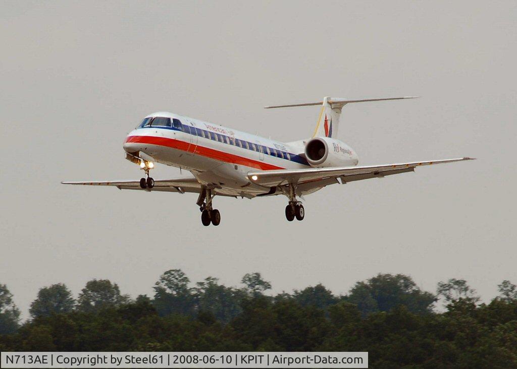 N713AE, 2000 Embraer ERJ-135LR (EMB-135LR) C/N 145249, Landing on 28L
