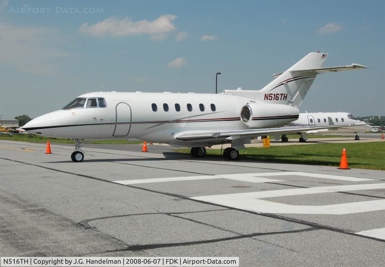N516TH, 1999 Raytheon Hawker 800XP C/N 258418, at FDK during AOPA Fly In