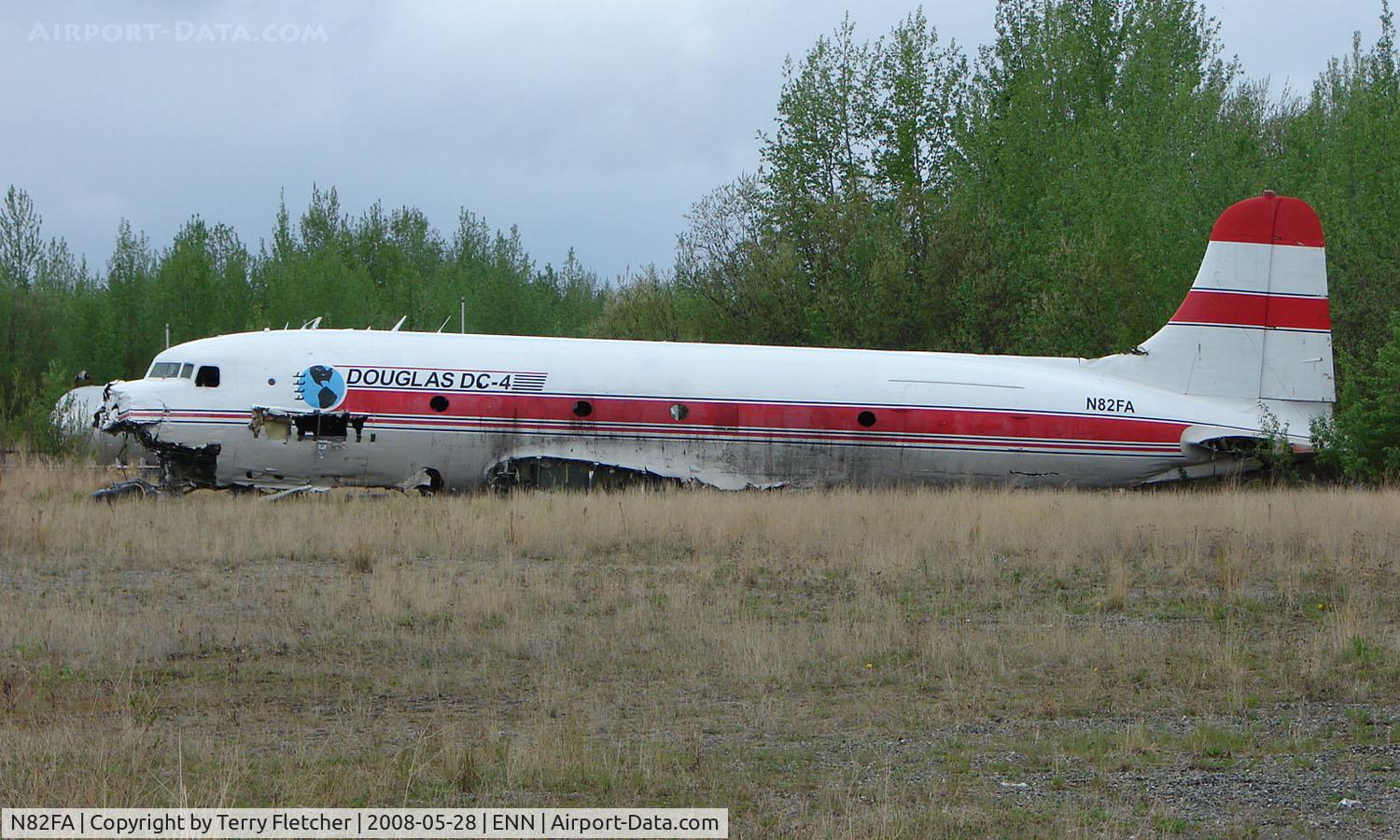 N82FA, 1945 Douglas C-54G Skymaster C/N 35960, This damaged DC-4 is well hidden from view at Neana Municipal , Alaska