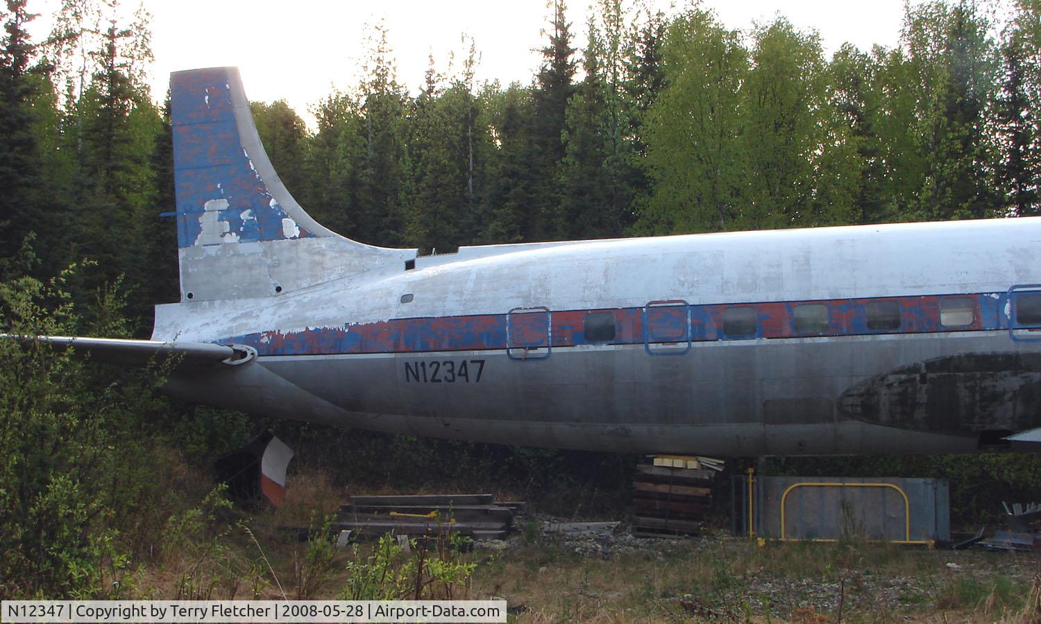 N12347, 1953 Douglas DC-6A C/N 44071, By the side of the Old Steese Highway in Fairbanks