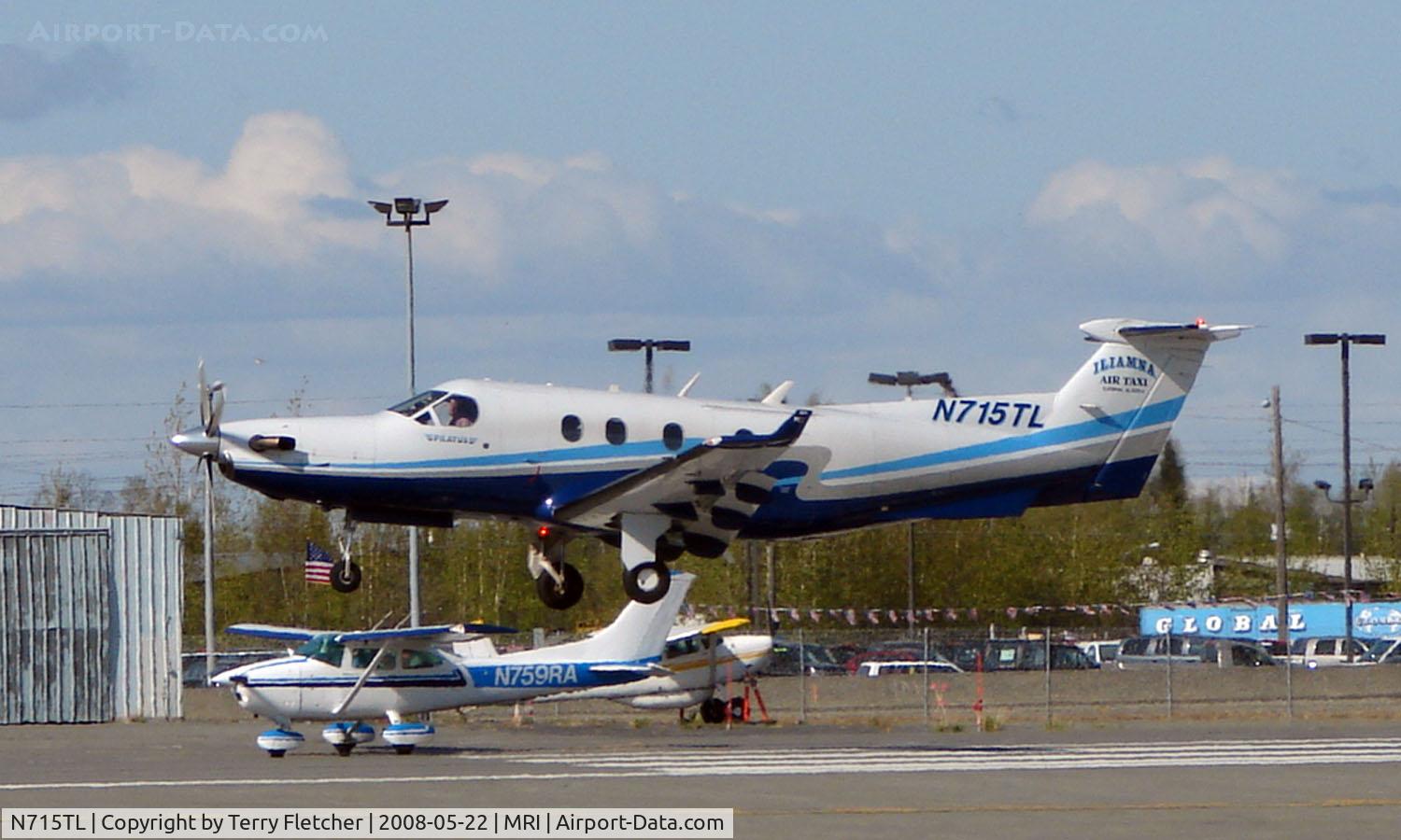 N715TL, 2004 Pilatus PC-12/45 C/N 548, Pilatus doing touch and gos at Merrill Field, Anchorage