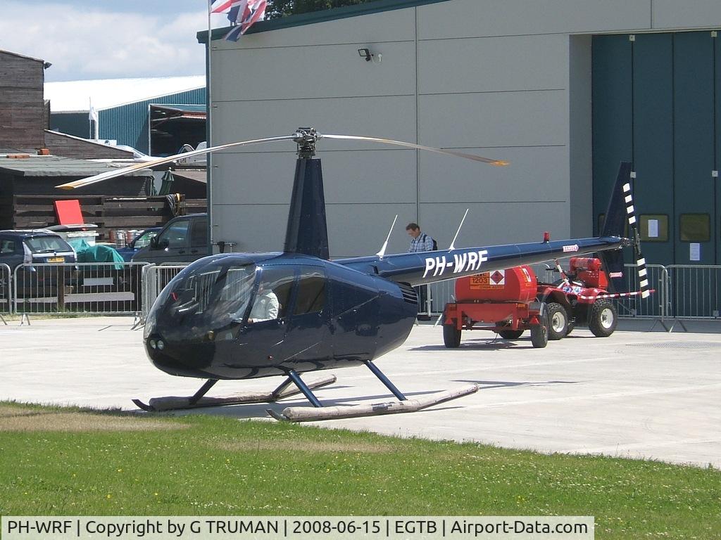 PH-WRF, 2000 Robinson R44 Clipper C/N 0816, At AeroExpo 2008 about to leave