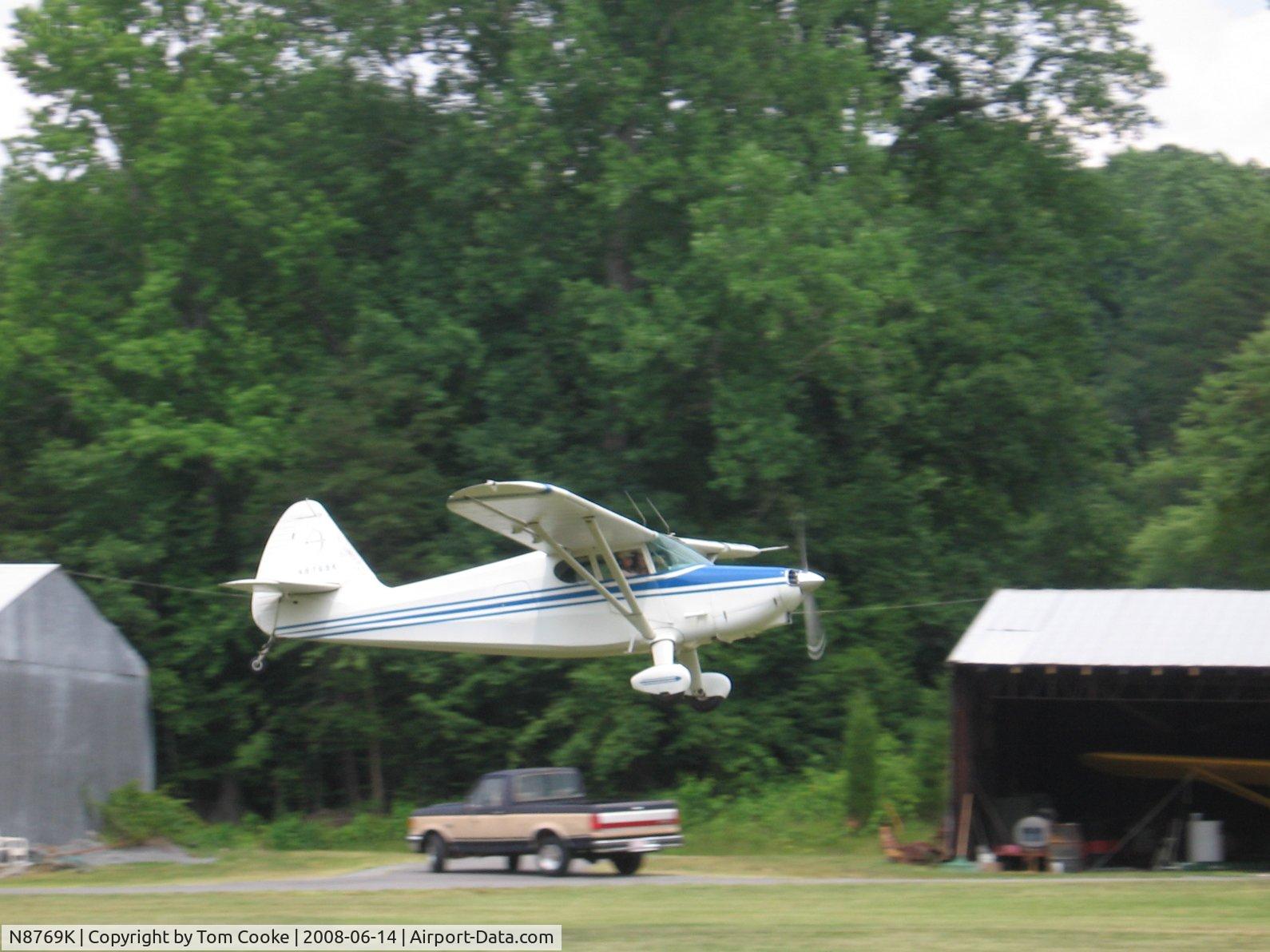 N8769K, 1947 Stinson 108-1 Voyager C/N 108-1769, Stinson departing