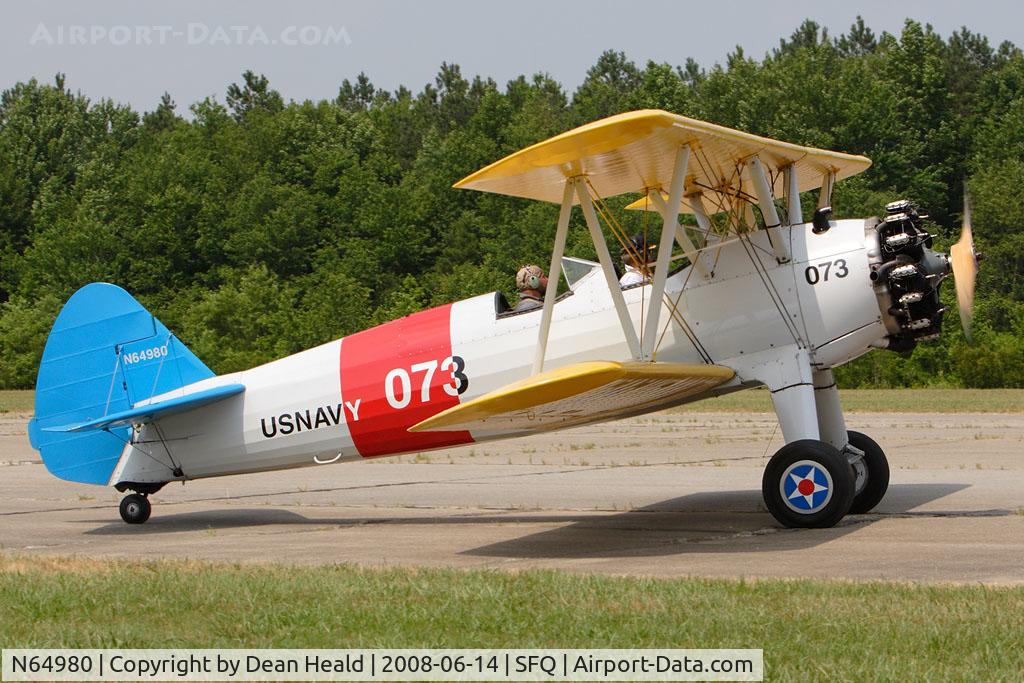 N64980, 1942 Boeing A75N1(PT17) C/N 75-3461, 1942 Stearman A75N1 PT-17 N64980 taxiing to the grass runway for takeoff.