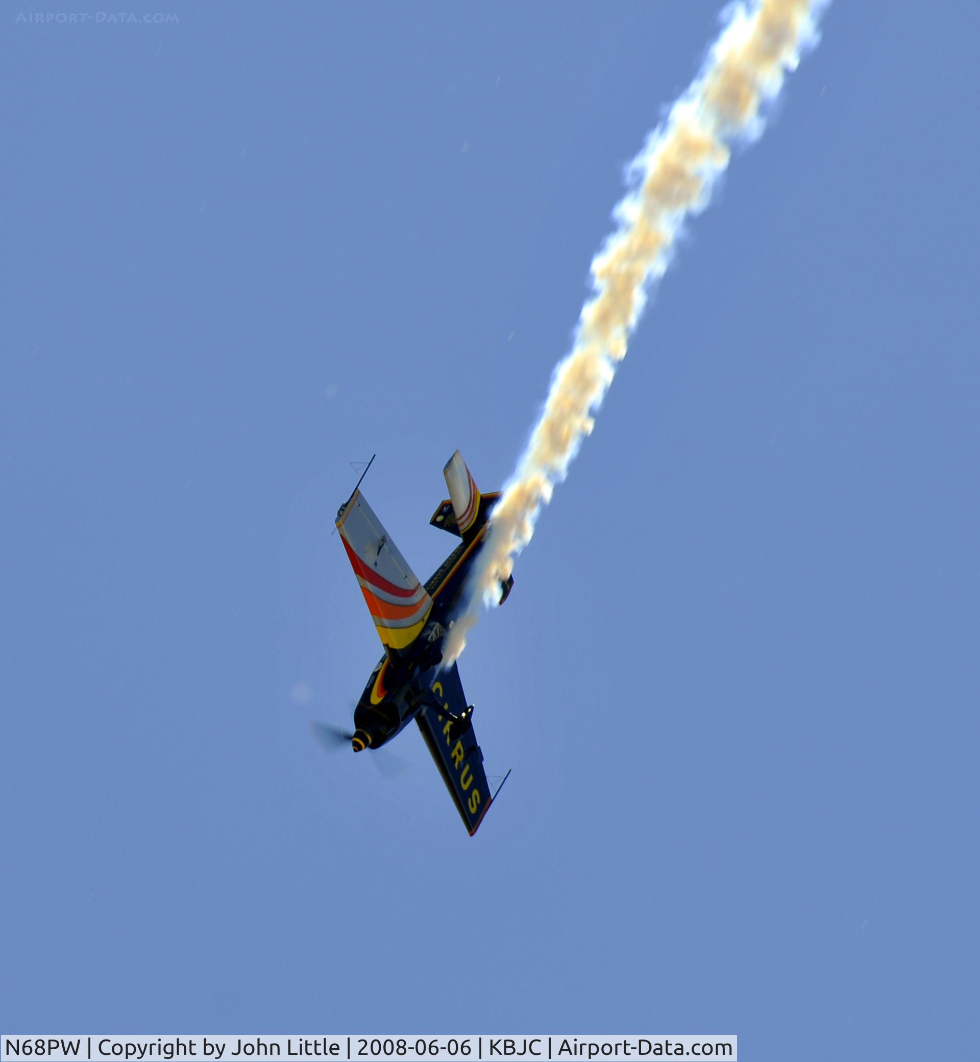 N68PW, Extra EA-300S C/N 030, Patty Wagstaff charging it up for the Open house