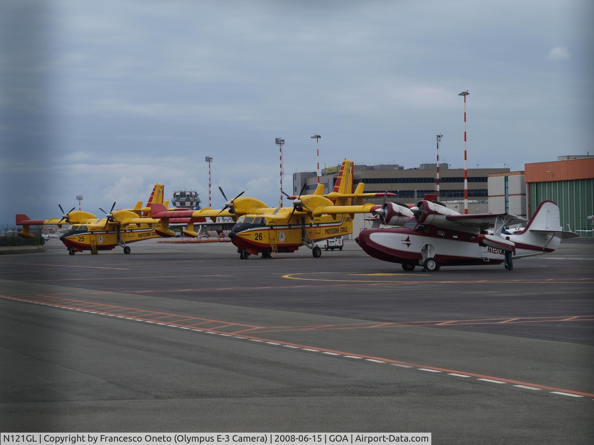N121GL, 1944 Grumman G-21A Goose C/N B-49, along with two Canadair CL-415 of Protezione Civile Italiana