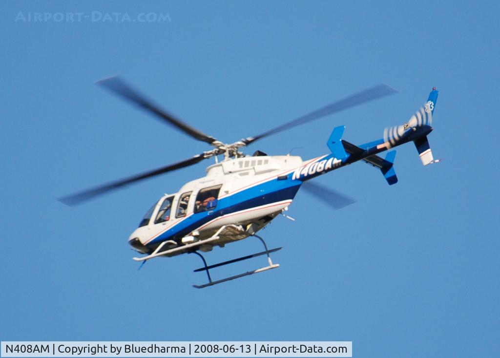 N408AM, 2000 Bell 407 C/N 53445, Flight over Columbine High School Littleton Colorado.