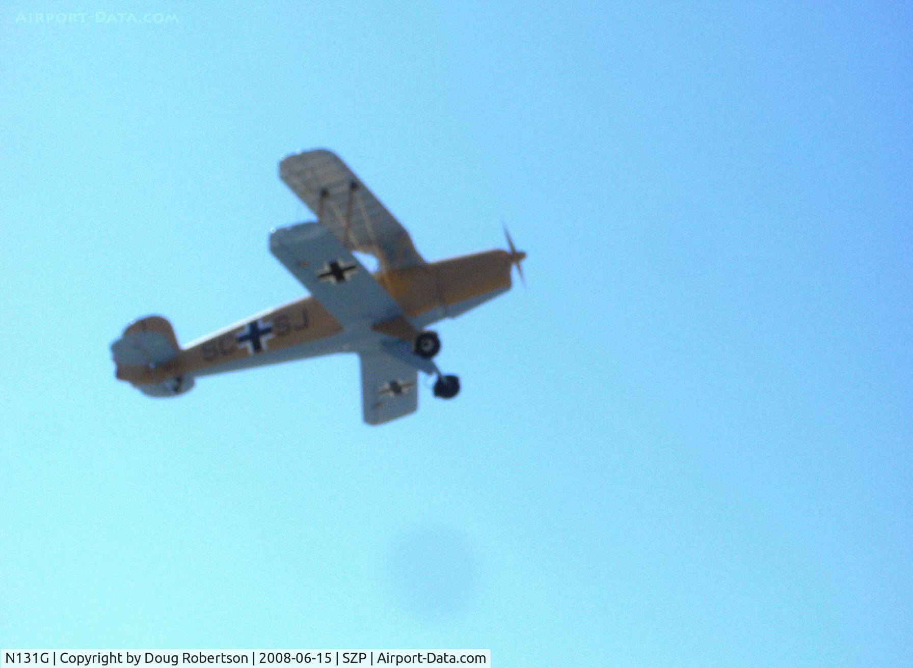 N131G, 1959 CASA 1-131 Jungmann C/N E3B-391, 1959 C.A.S.A. 1.131 Bucker JUNGMANN, listed as having a Lycoming O&VO-180 but looks and sounds like an original inverted in-line engine-which in fact is a LOM 332AK of 140 Hp with four exhaust ports, Takeoff climb Rwy 22