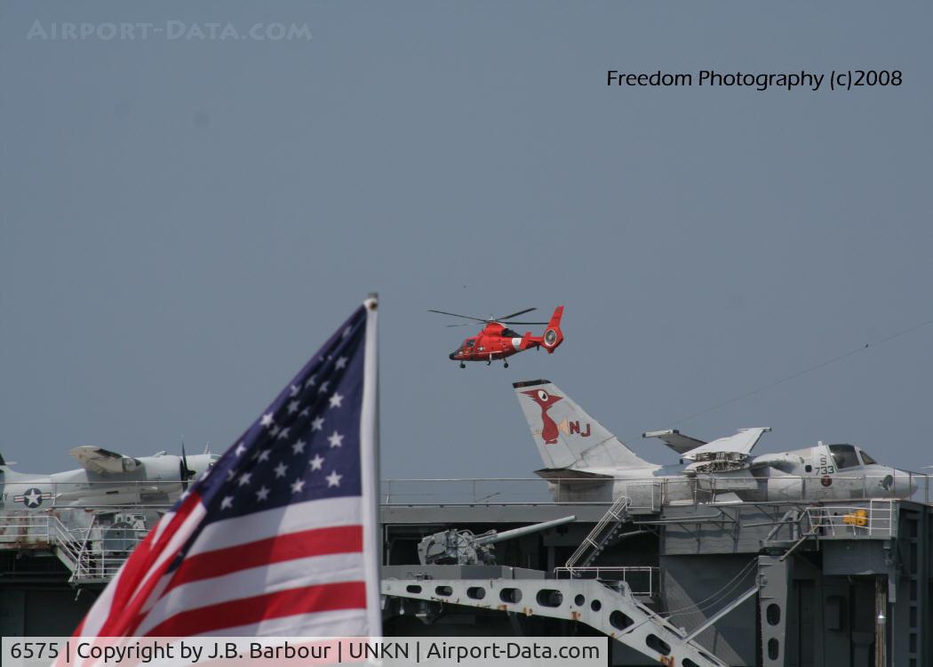 6575, Aerospatiale HH-65C Dolphin C/N 6271, This was a fly over at the USS Yorktown.  I have no idea what type of helicopter.  If you know drop me a line.