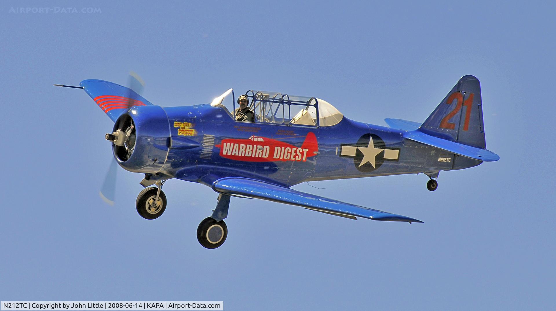 N212TC, 1944 North American SNJ-5 Texan Texan C/N 121-41732, Gary landing with new SNJ Warbird at Centennial