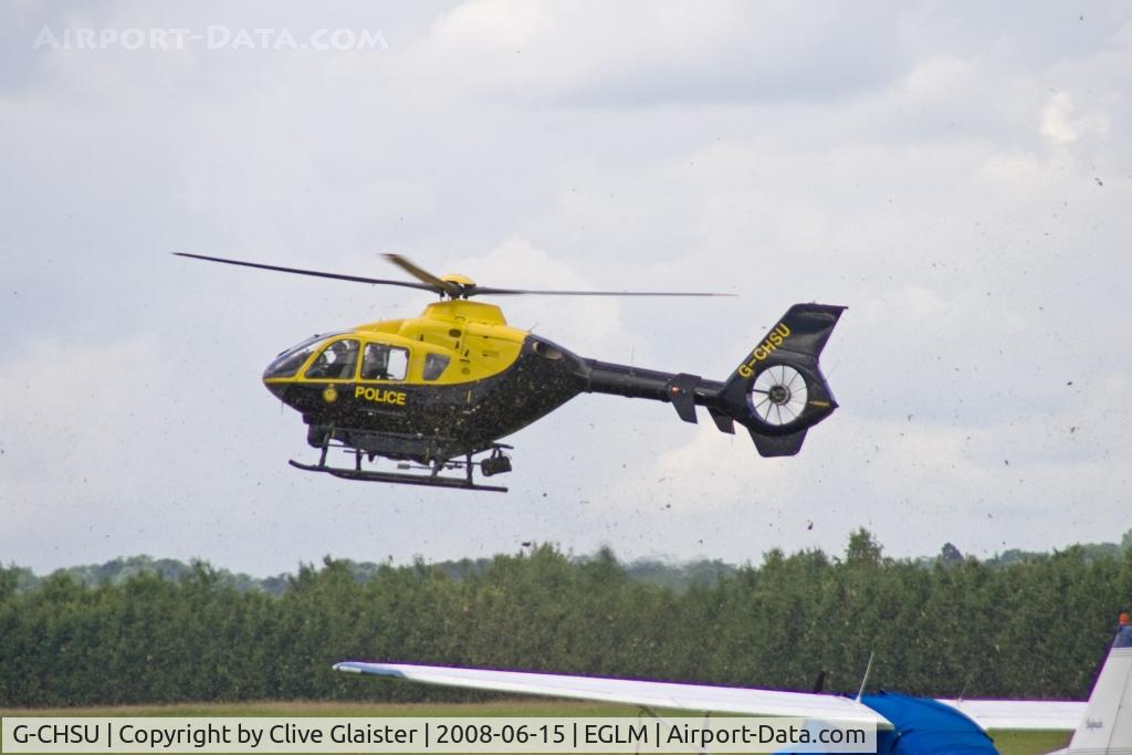 G-CHSU, 1998 Eurocopter EC-135T-1 C/N 0079, Registered Owner: THAMES VALLEY POLICE AUTHORITY - CHILTERN AIR SUPPORT UNIT. THE DOWN WASH FROM THE ROTORS IS DISPLACING THE GRASS CLIPPINGS