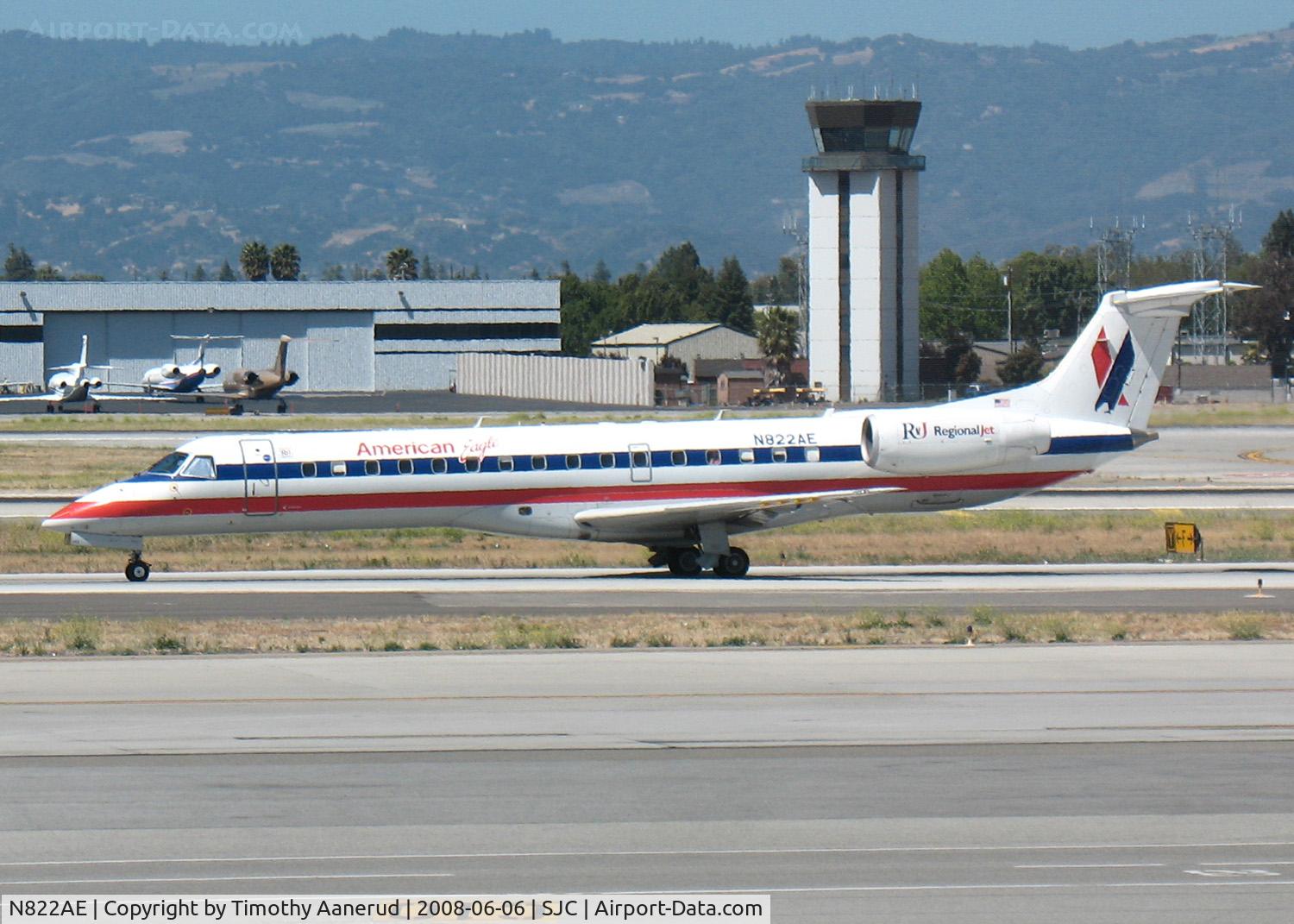 N822AE, 2002 Embraer ERJ-140LR (EMB-135KL) C/N 145581, Taxiing to active at SJC