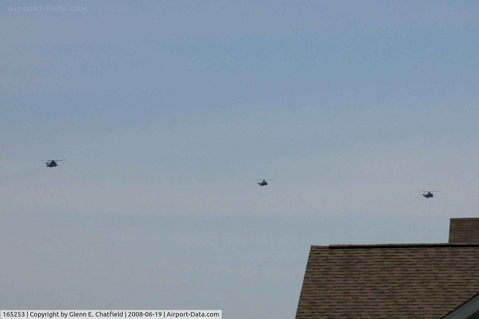 165253, Sikorsky CH-53E Super Stallion C/N 65-647, On the left is 165253.  One of the two VH-3Ds is Marine One.  Flying over North Liberty, IA, will pass about 1 mile SW of my house.