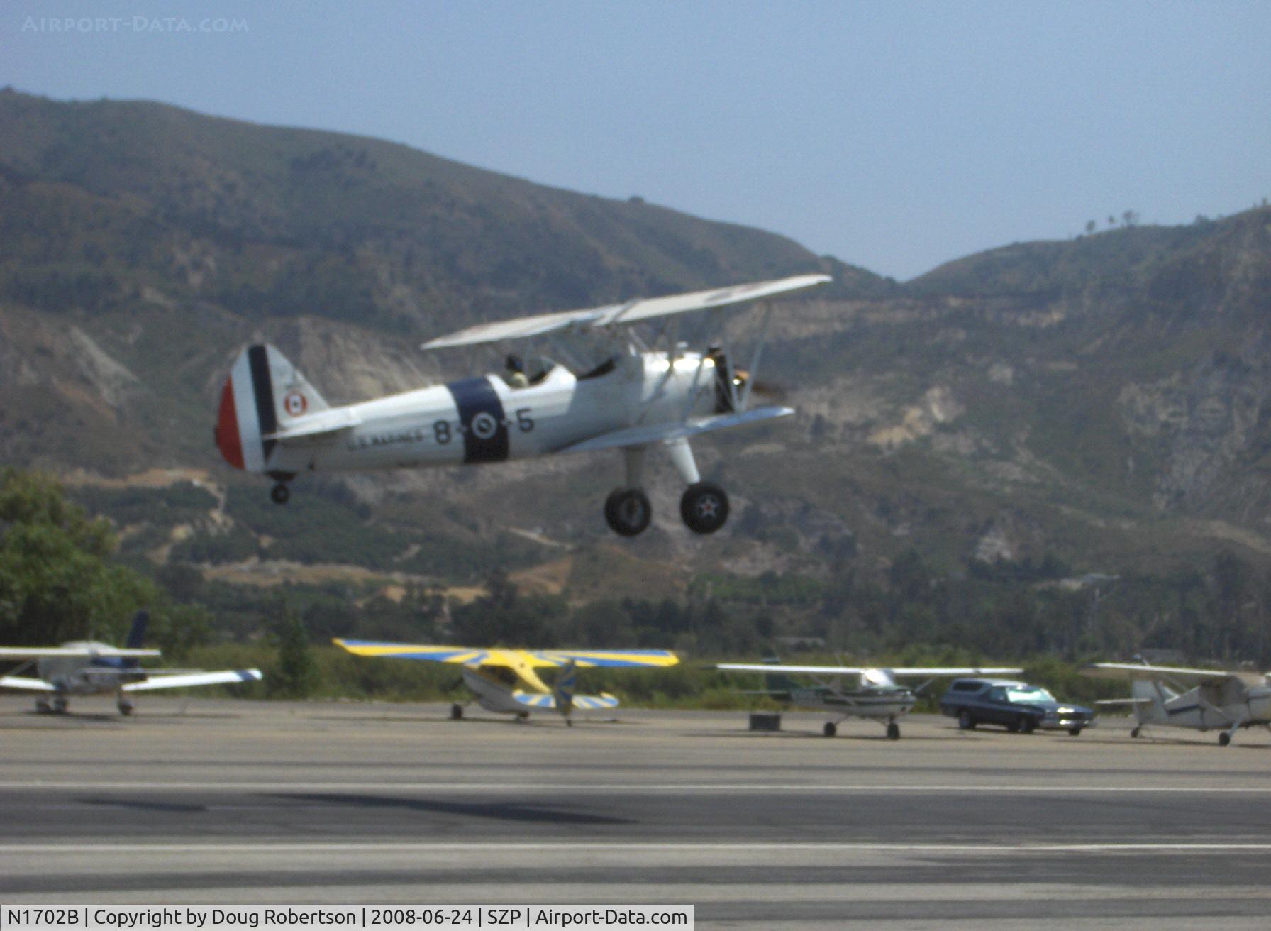 N1702B, 1942 Boeing PT-13D Kaydet (E75) C/N 75-5903, 1942 Boeing Stearman PT-13D 'Ruthie's Doll', Continental W670 220 Hp, takeoff climb Rwy 22
