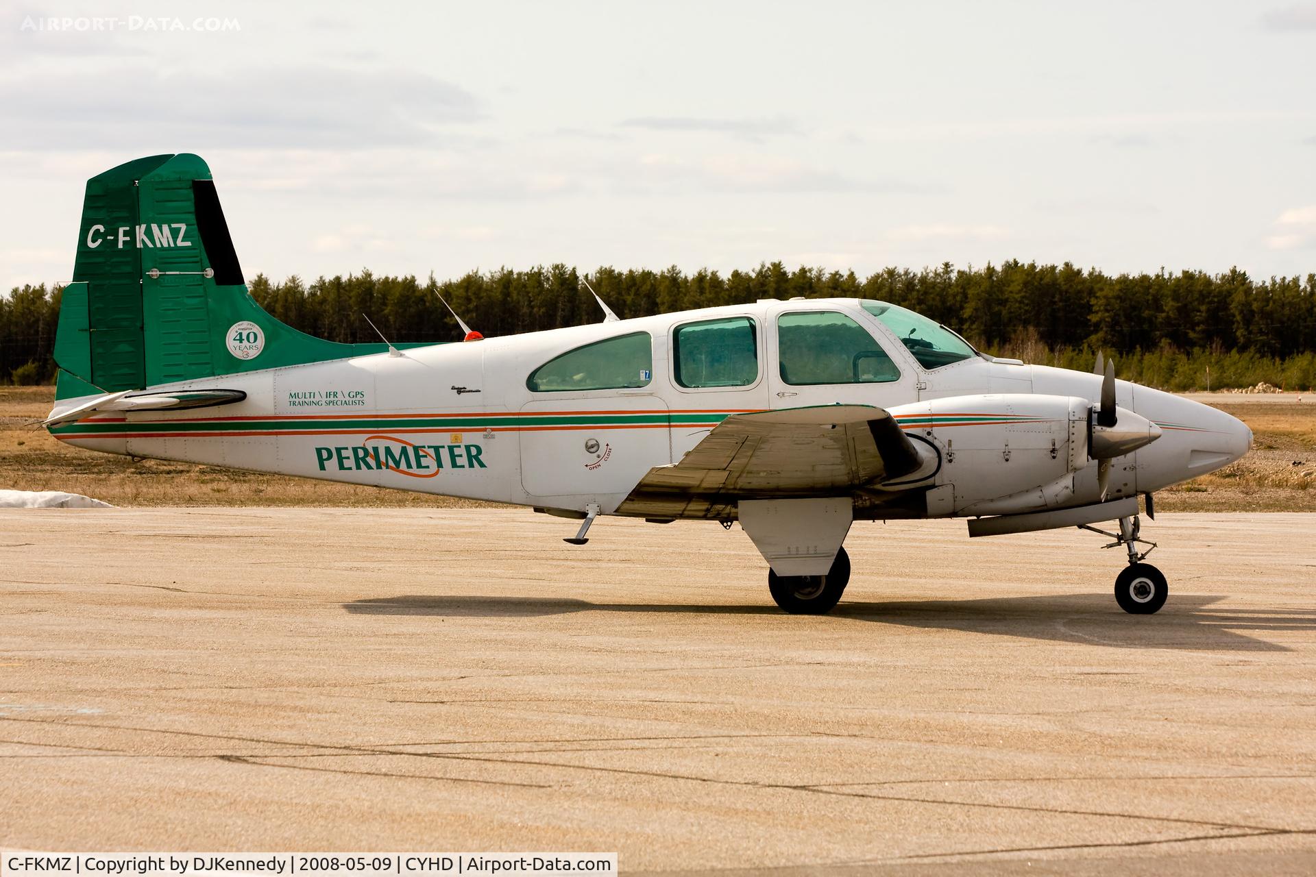 C-FKMZ, 1967 Beech E95 Travel Air C/N TD-708, Sitting on the ramp at the CYHD airport.