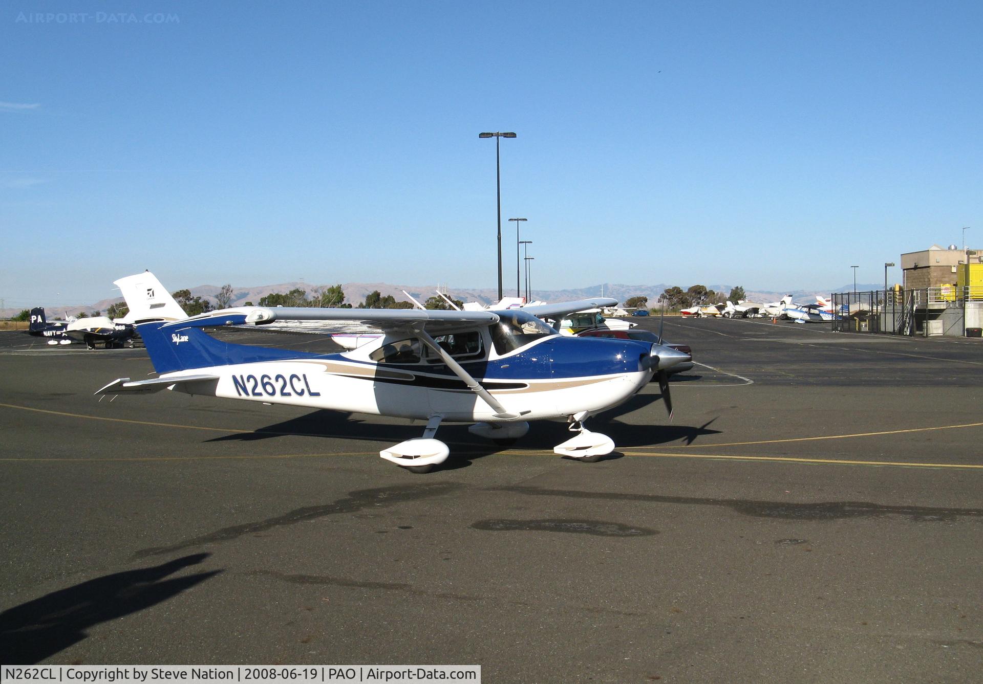 N262CL, 2004 Cessna 182T Skylane C/N 18281497, 2004 Cessna 182T taxying in late afternoon sun @ Palo Alto, CA