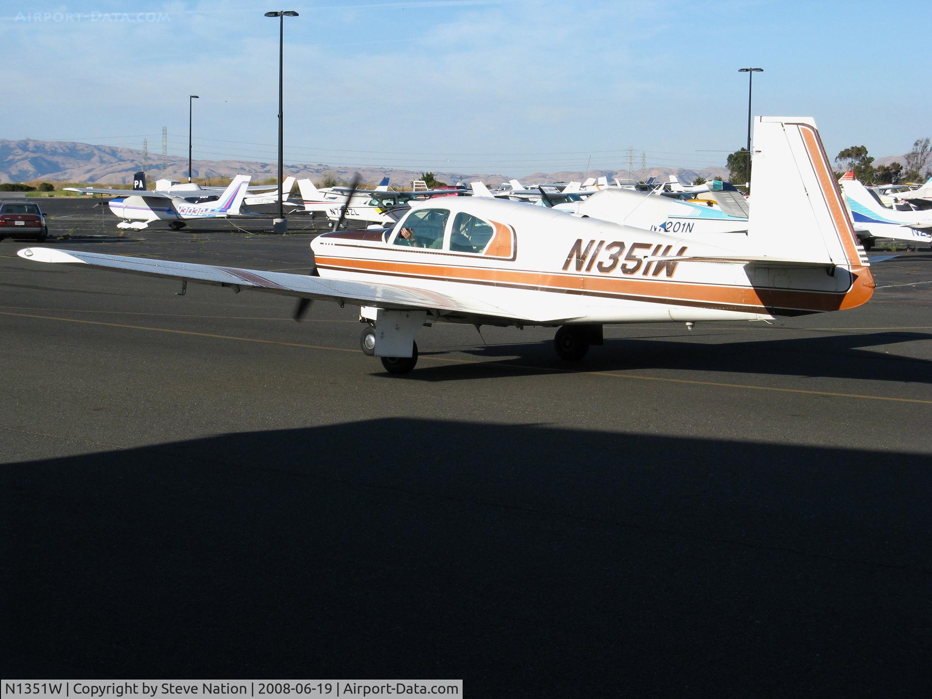 N1351W, 1963 Mooney M20C Ranger C/N 2632, 1963 Mooney M20C taxying in late afternoon sunshine @ Palo Alto, CA