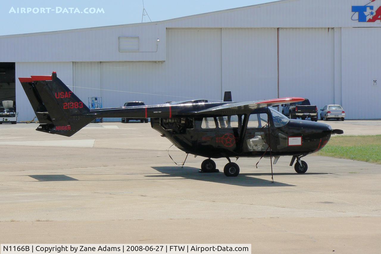 N1166B, 1967 Cessna O-2A Super Skymaster C/N 337M-0089, Sitting at the propshop...Meacham Field