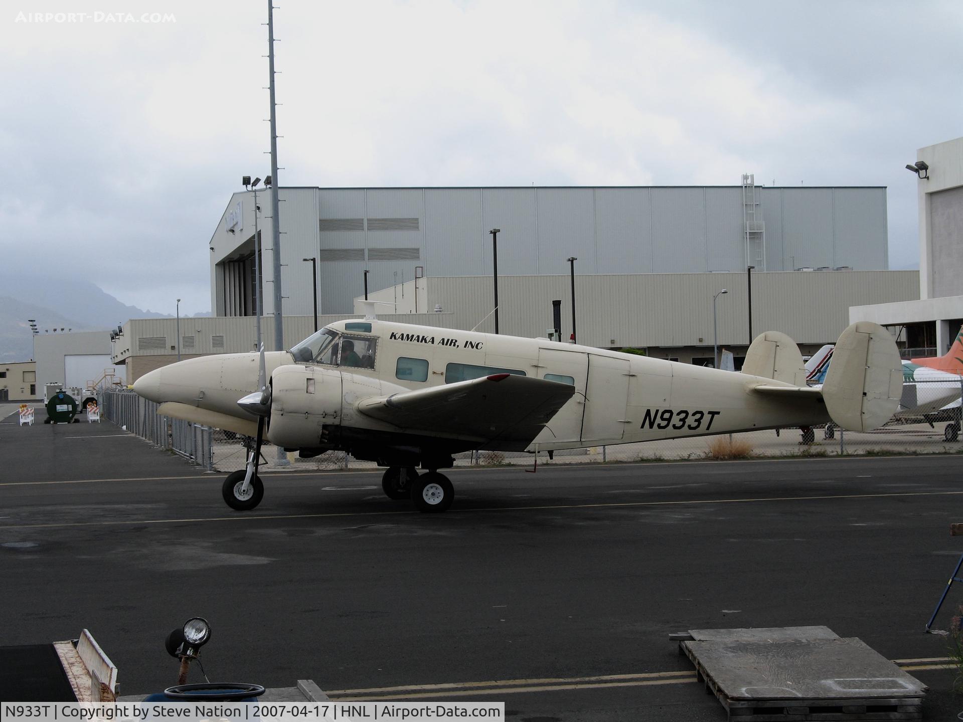 N933T, 1964 Beech H-18 Tri-Gear C/N BA-665, Kamaka Air Inc (cargo) 1964 Beech H-18 starting engines @ Honolulu, HI