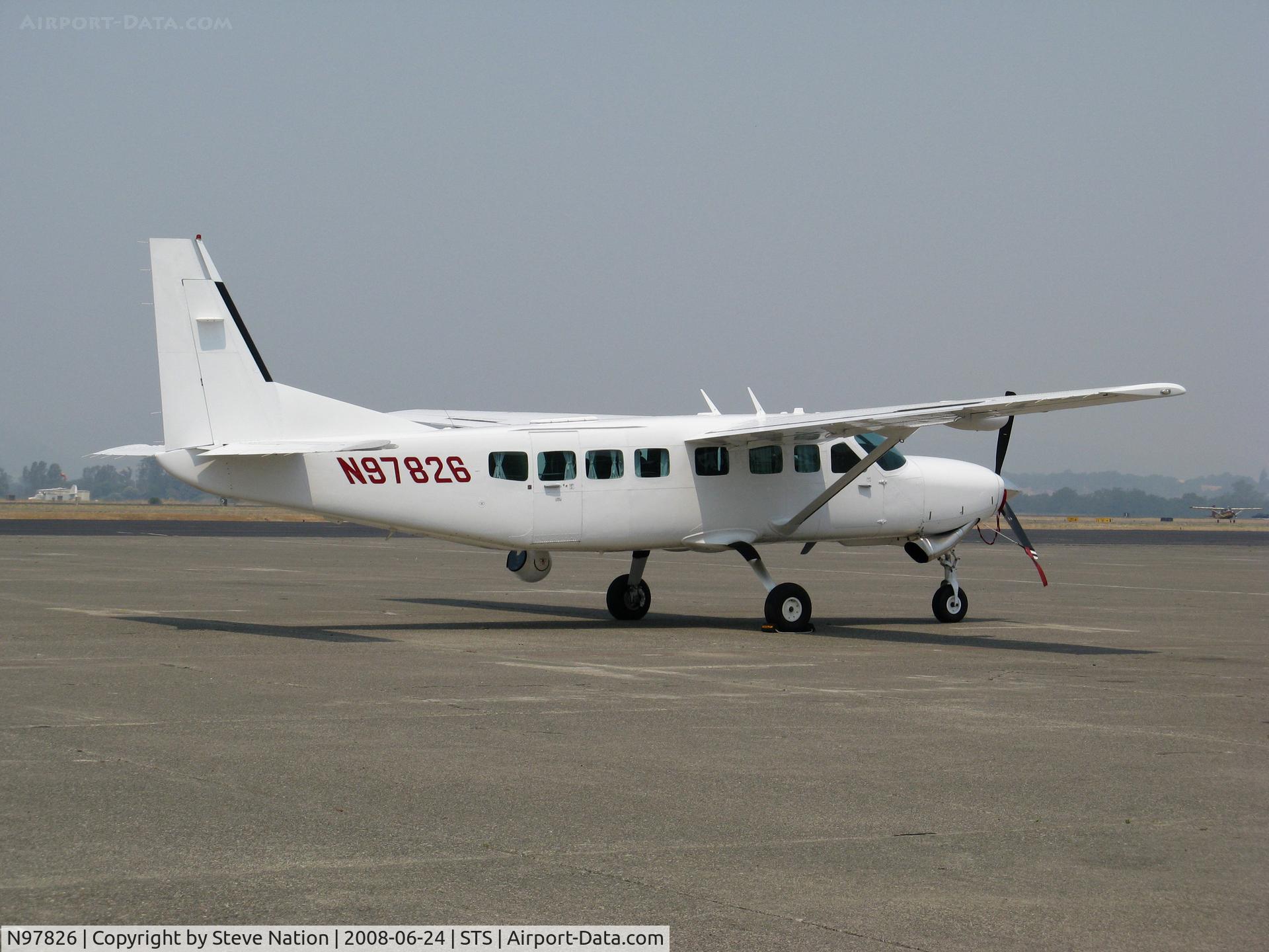 N97826, 2006 Cessna 208B C/N 208B1223, All-white 2006 Cessna 208B with FLIR pod in VERY hazy conditions @ Santa Rosa, CA