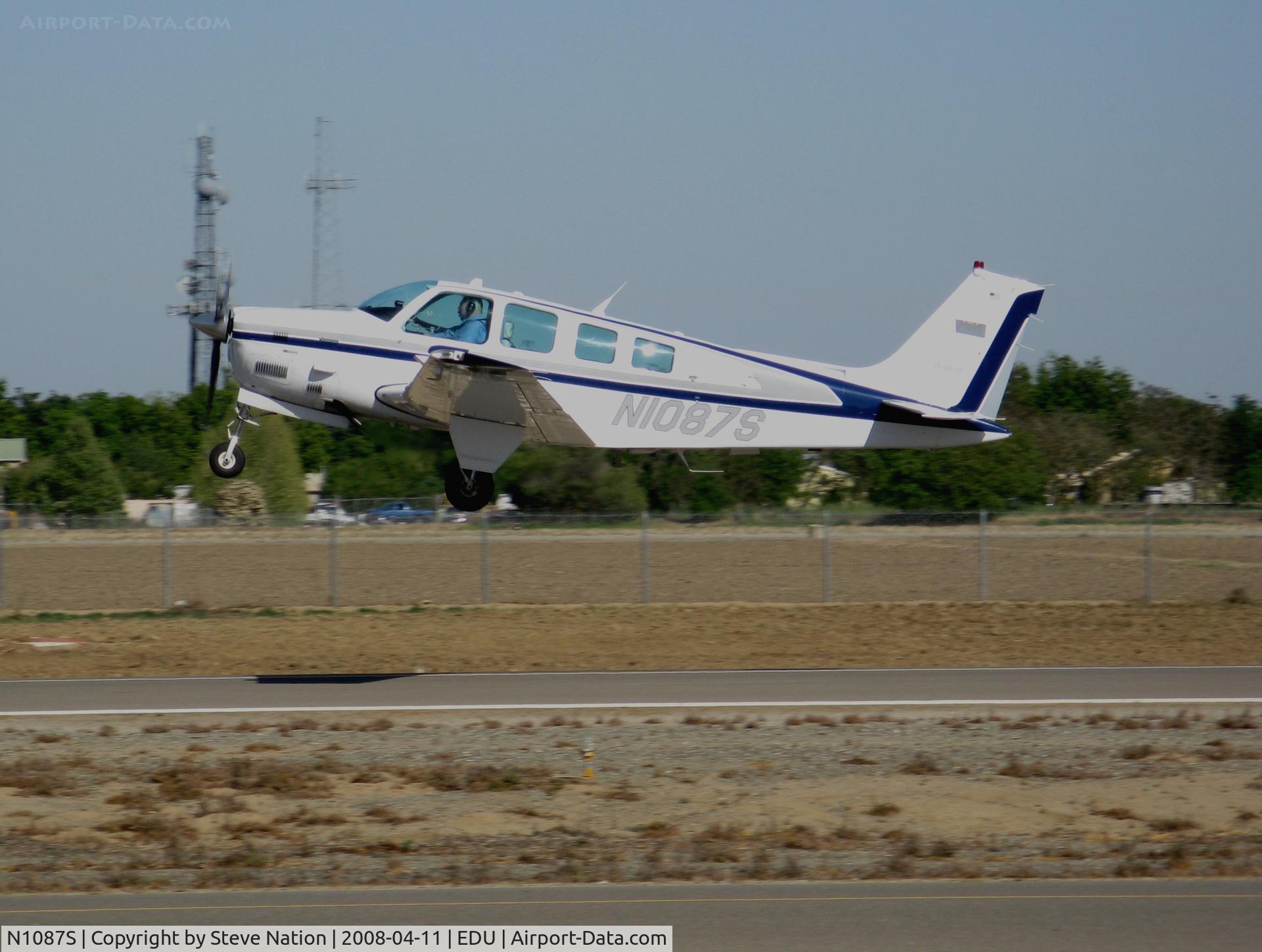 N1087S, 1996 Beech B36TC Bonanza C/N EA-587, 1996 Beech B36TC lifting off @ Davis-Yolo County Airport, CA