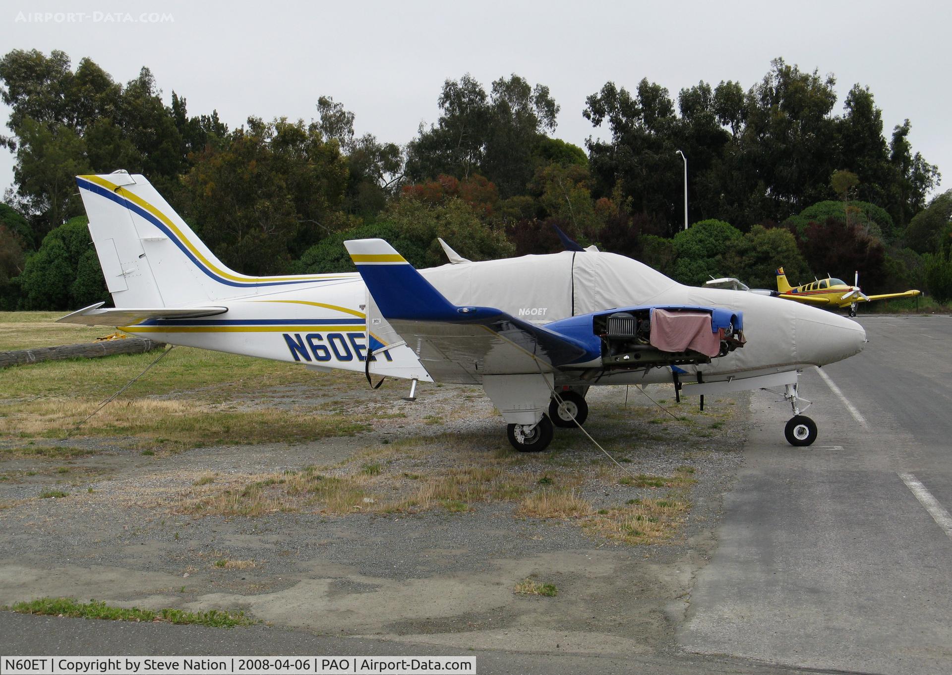 N60ET, 1977 Beech 58TC Baron C/N TK-57, Beech 58TC no props with winglets (and cover) @ Palo Alto, CA