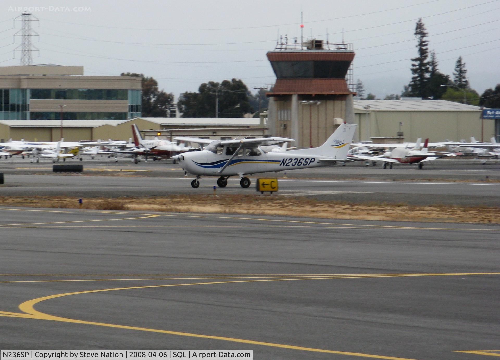 N236SP, 1999 Cessna 172S C/N 172S8213, 1999 Cessna 172S taxying across active runway @ San Carlos, CA