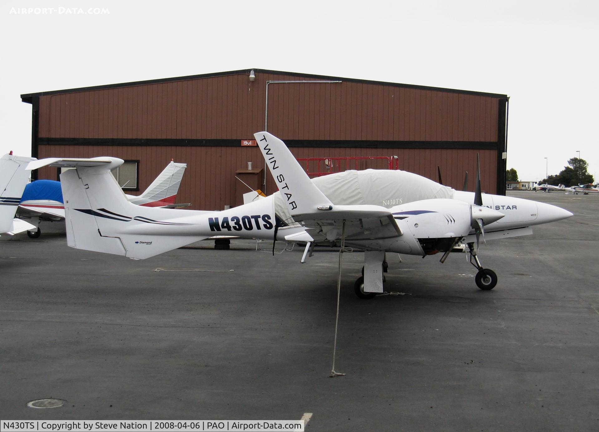 N430TS, 2006 Diamond DA-42 Twin Star C/N 42.AC030, 2006 Diamond Aircraft Ind Inc DA 42 with cover @ Palo Alto, CA