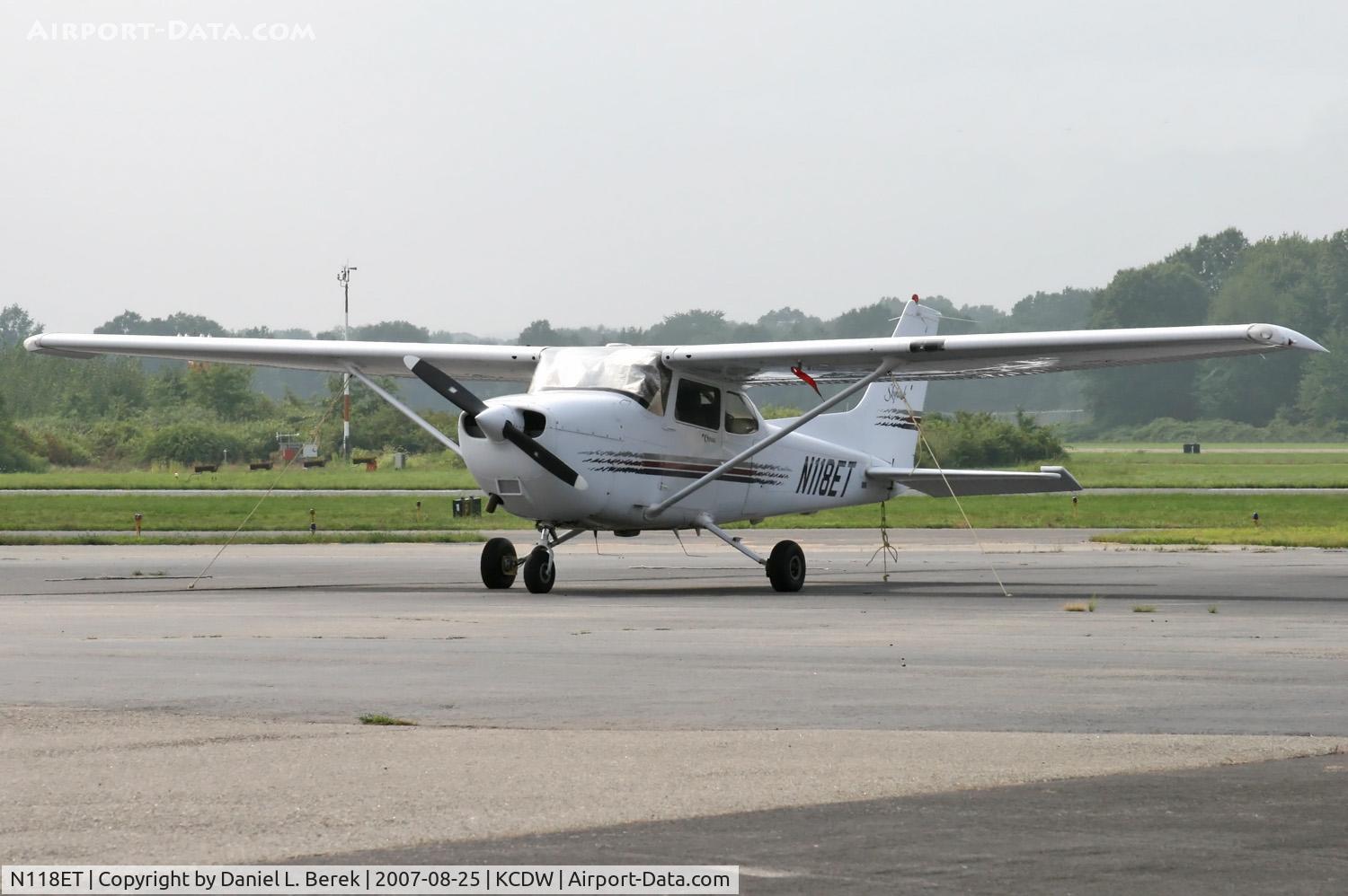 N118ET, 1997 Cessna 172R C/N 17280019, Young Skyhawk sits under a brooding late summer sky.