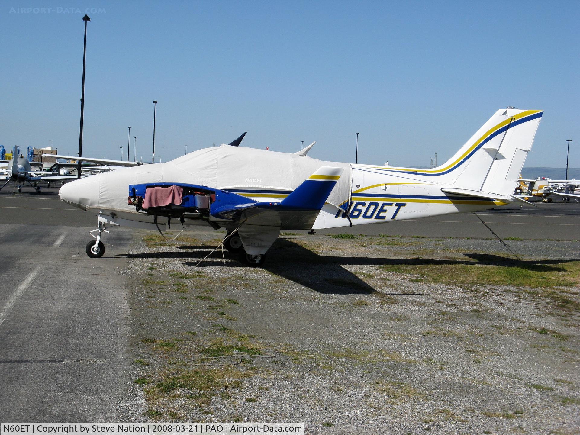 N60ET, 1977 Beech 58TC Baron C/N TK-57, Beech 58TC with cover and engine removed @ Palo Alto, CA