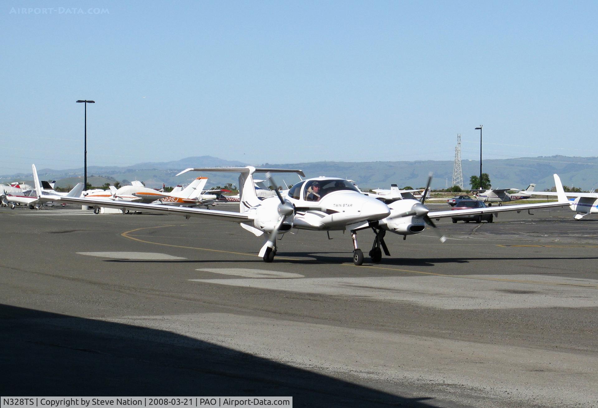 N328TS, 2006 Diamond DA-42 Twin Star C/N 42.AC028, 2006 Diamond Aircraft Ind Inc DA 42 head-on taxying @ Palo Alto, CA