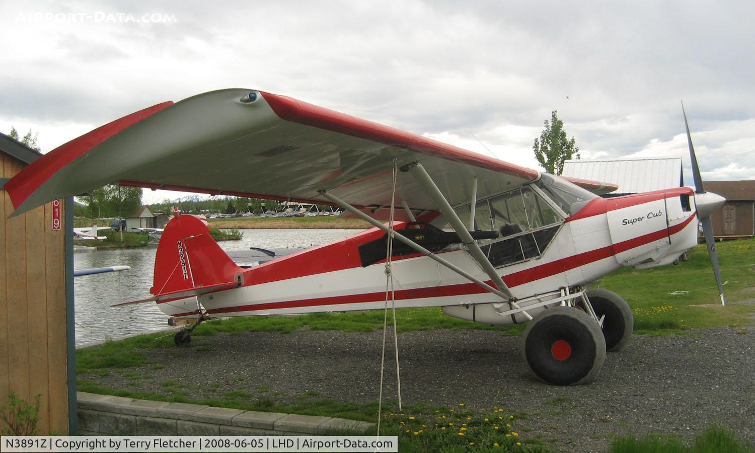 N3891Z, 1961 Piper PA-18-150 Super Cub C/N 18-7707, Piper Pa-18-150  at Lake Hood AK - note the carrying case for the sporting gun