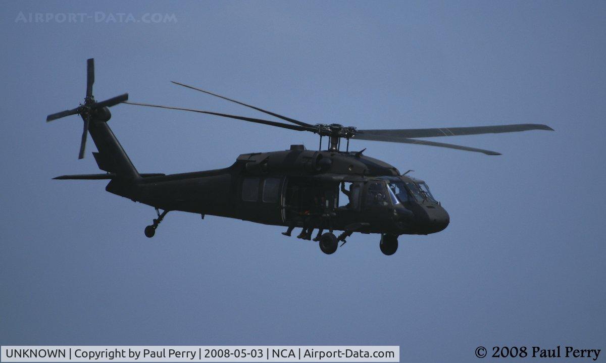 UNKNOWN, Helicopters Various C/N unknown, The Black Daggers' jump platform for the day.  Headed aloft, as they ride in the open cabin door.