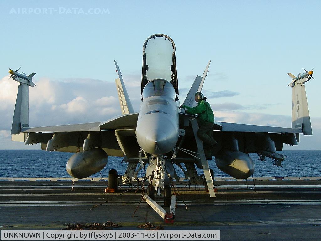 UNKNOWN, , US Navy FA-18E chocked & folded