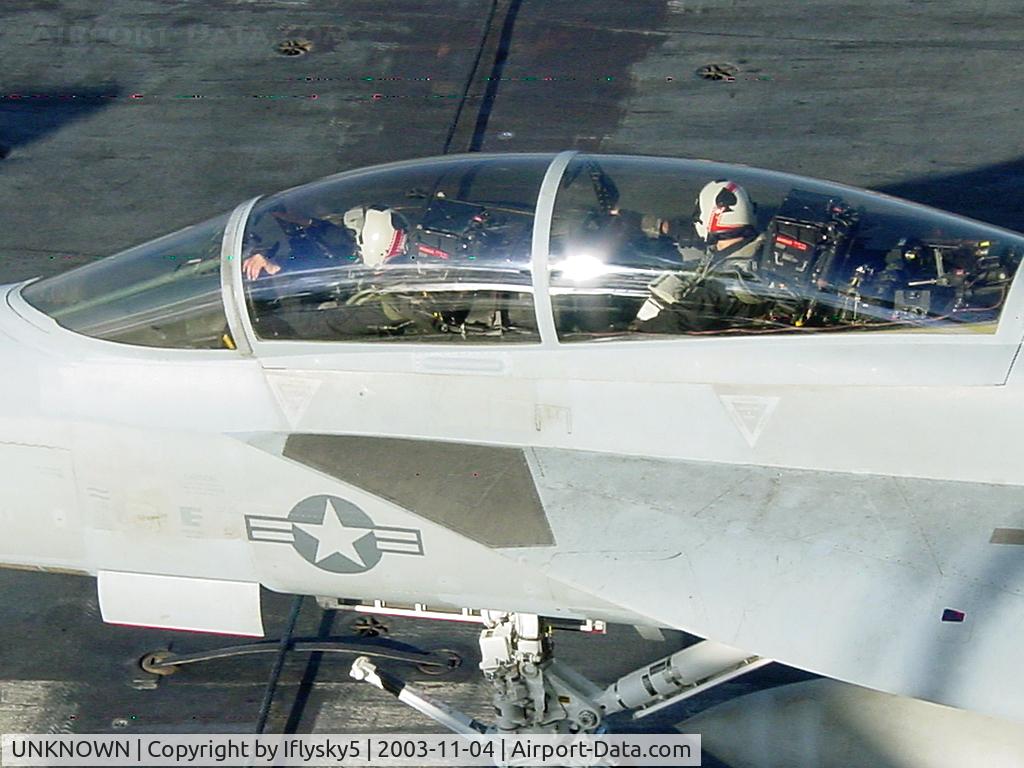 UNKNOWN, , US Navy FA-18 of the Black Aces prepares for the cat shot