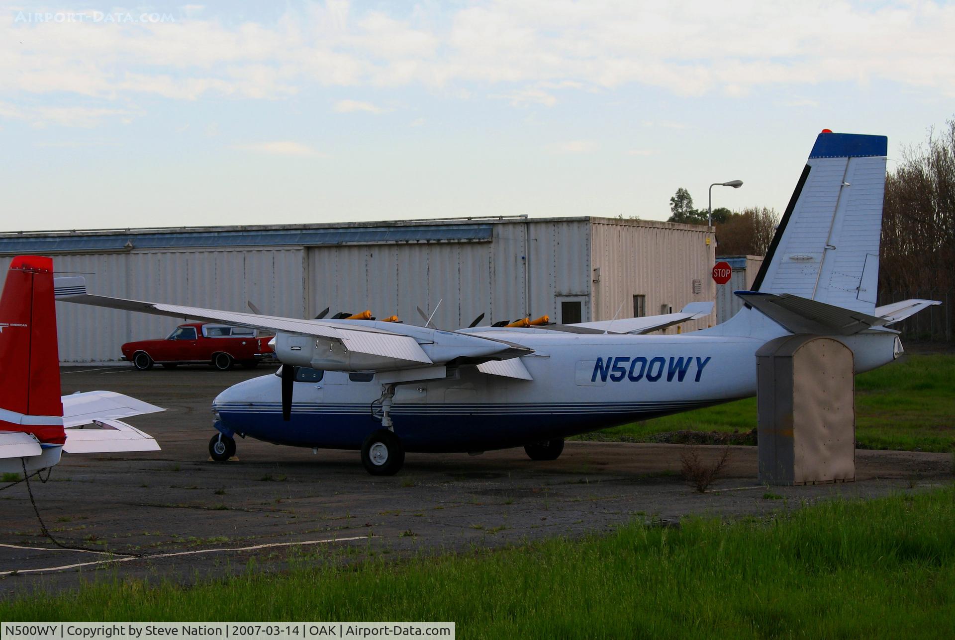 N500WY, 1963 Aero Commander 500B Commander C/N 500B-1297-112, (FAA Register says this is a Pilatus PC-12 but camera says its an) Aero Commander 560 (?) in late afternoon sun @Oakland, CA