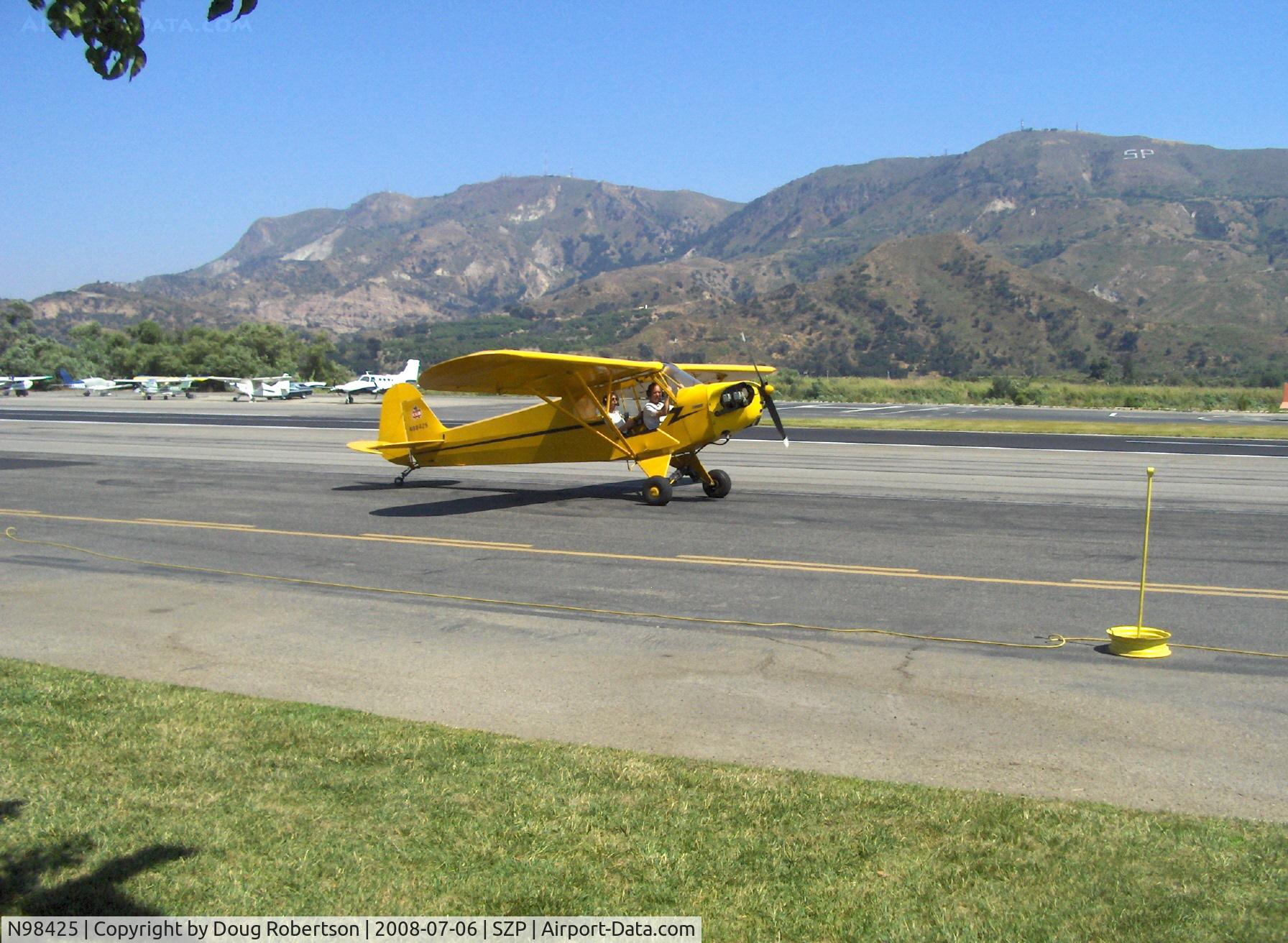N98425, 1946 Piper J3C-65 Cub Cub C/N 18612, 1946 Piper J3C-65 CUB, Continental C90 upgrade, taxi to hangar