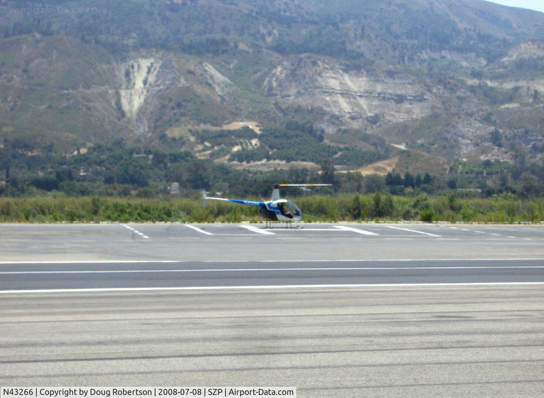 N43266, 1990 Robinson R22 Beta C/N 1268, 1990 Robinson R22 Beta, Lycoming O-320-BC, touchdown