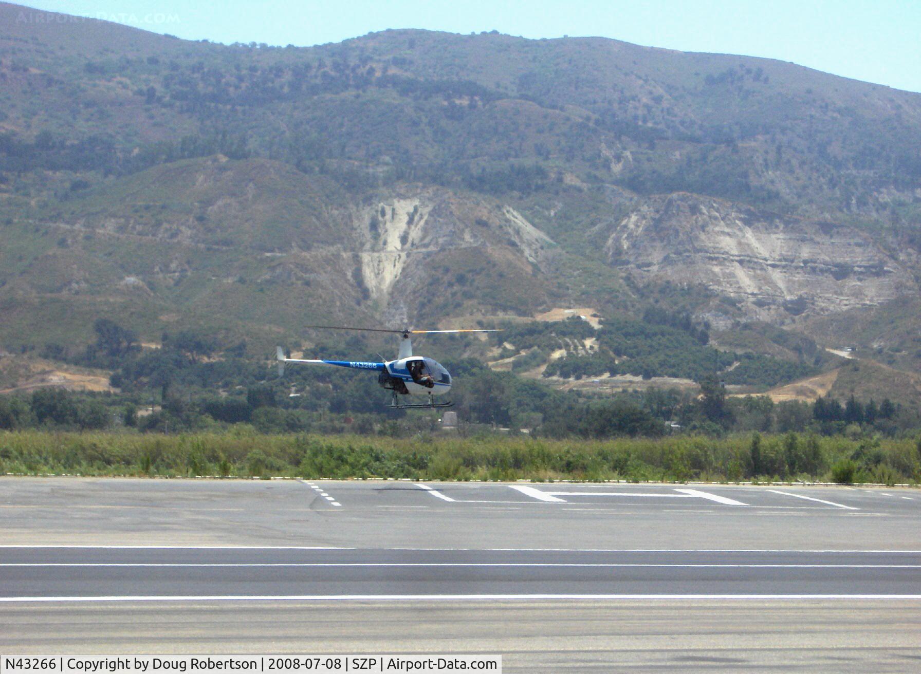 N43266, 1990 Robinson R22 Beta C/N 1268, 1990 Robinson R22 Beta, Lycoming O-320-BC, approaching SZP Helipad