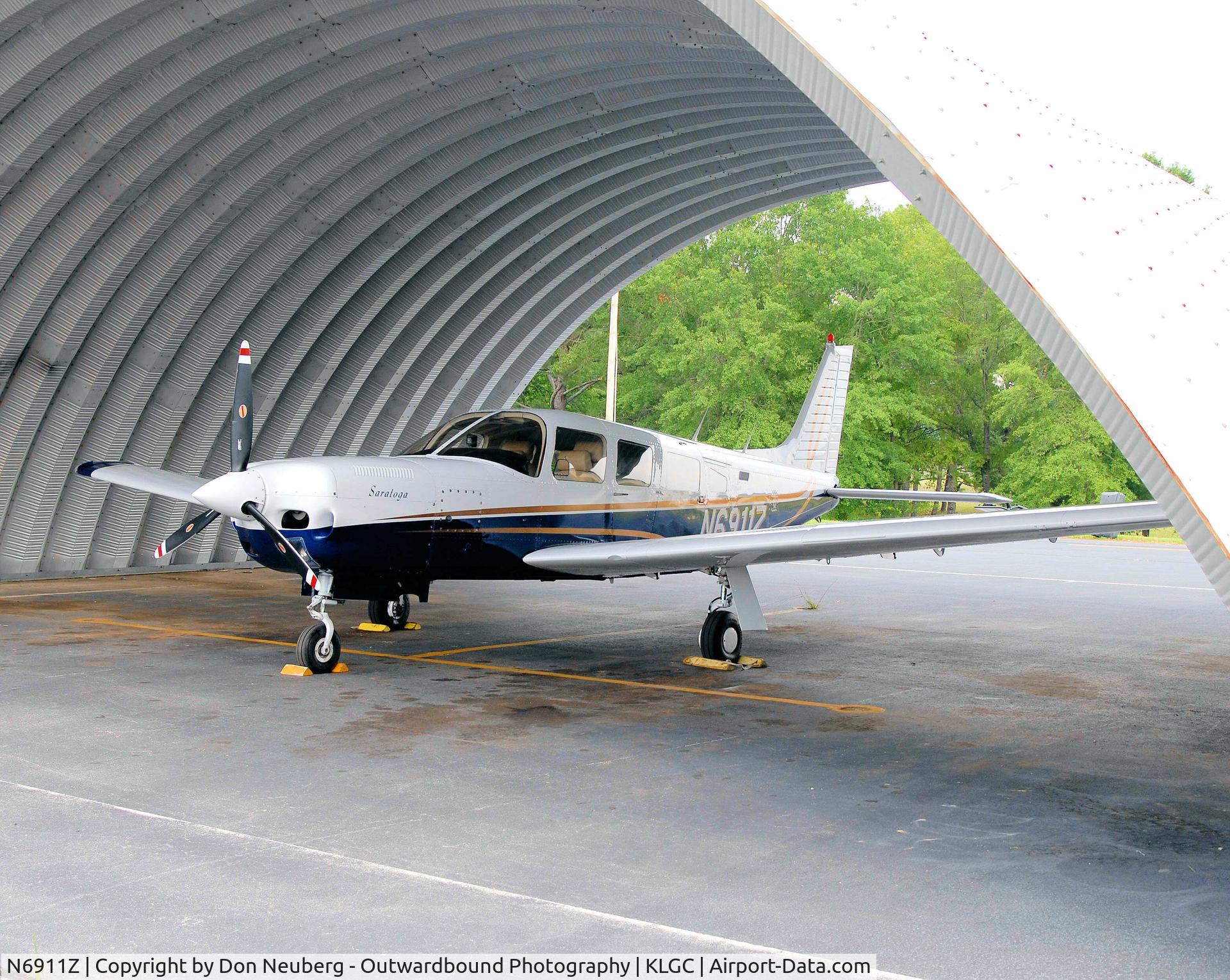 N6911Z, 1985 Piper PA-32R-301T Turbo Saratoga C/N 32R-8529015, Under a shade porch