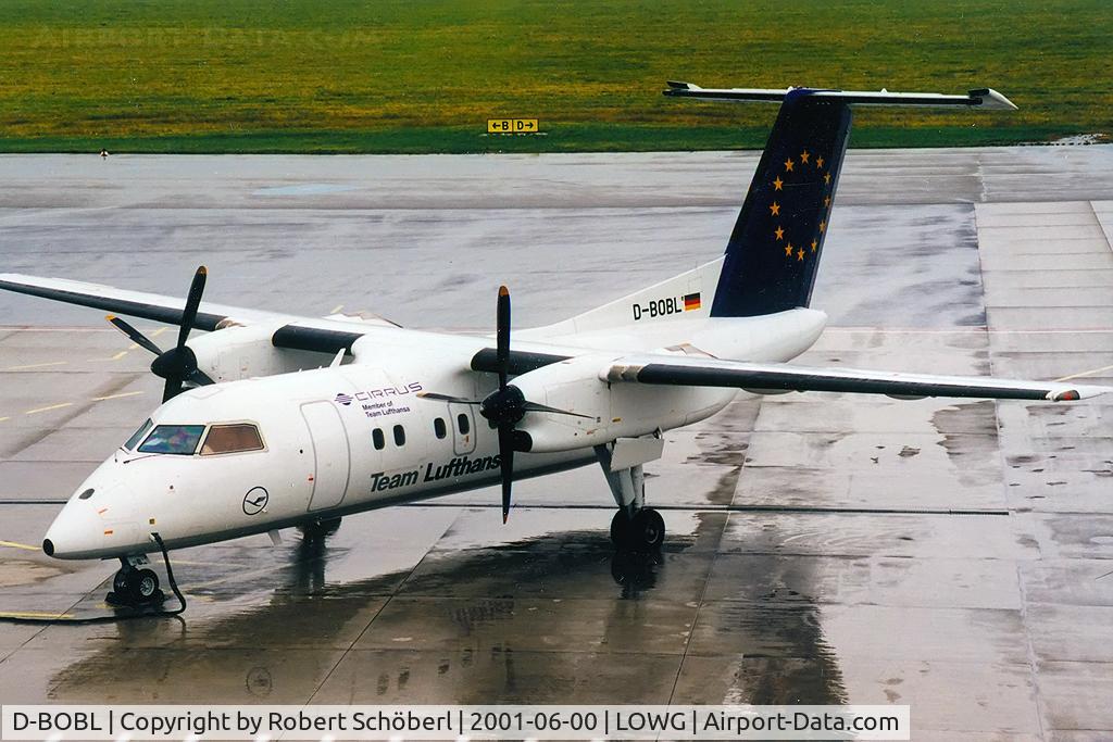 D-BOBL, 1990 De Havilland Canada DHC-8-102 Dash 8 C/N 225, Rainy day at LOWG