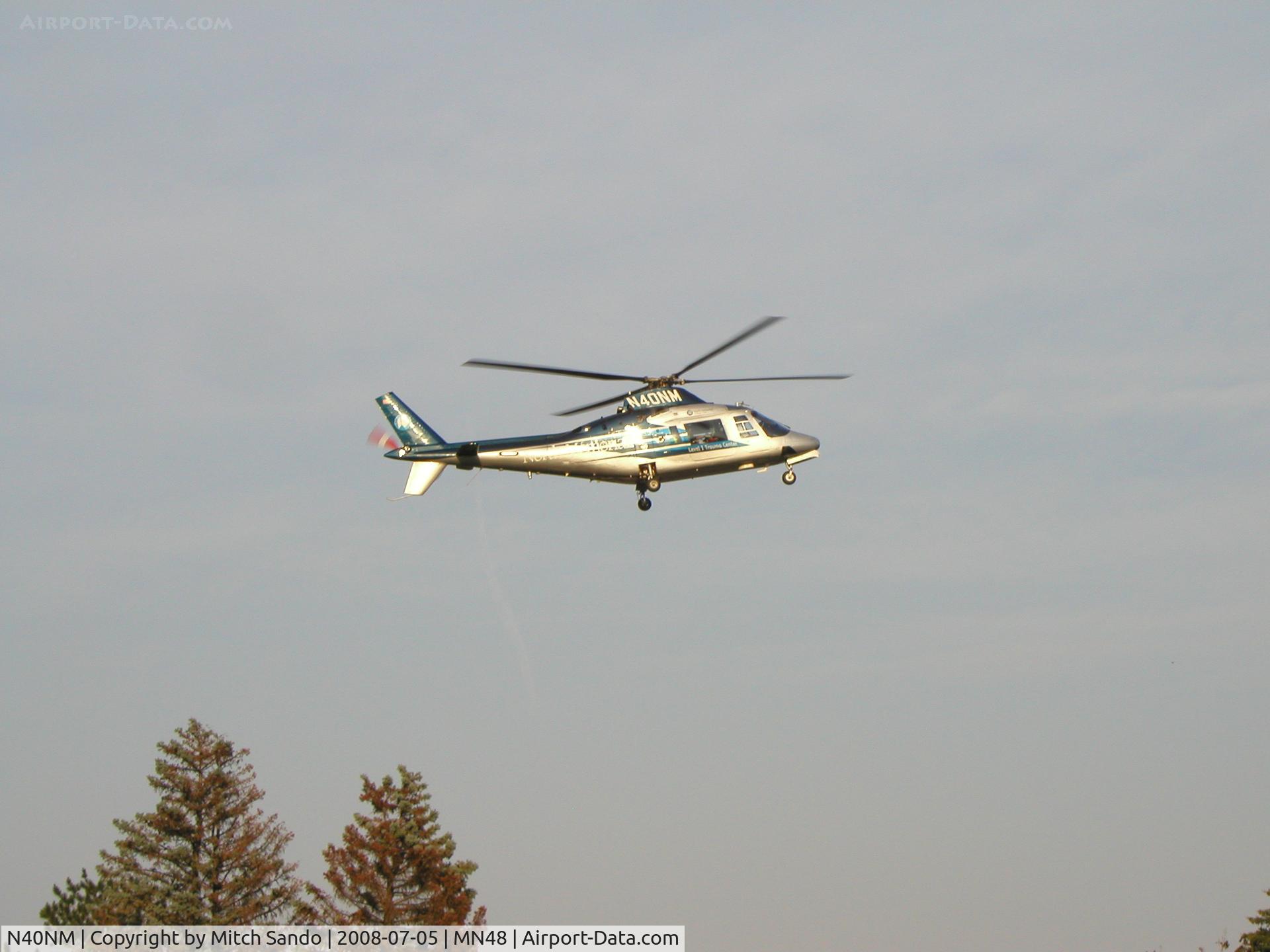 N40NM, 1987 Agusta A109A II C/N 7395, Air Care 5 landing on the parking ramp near the main helipad at St. Luke's in Duluth.