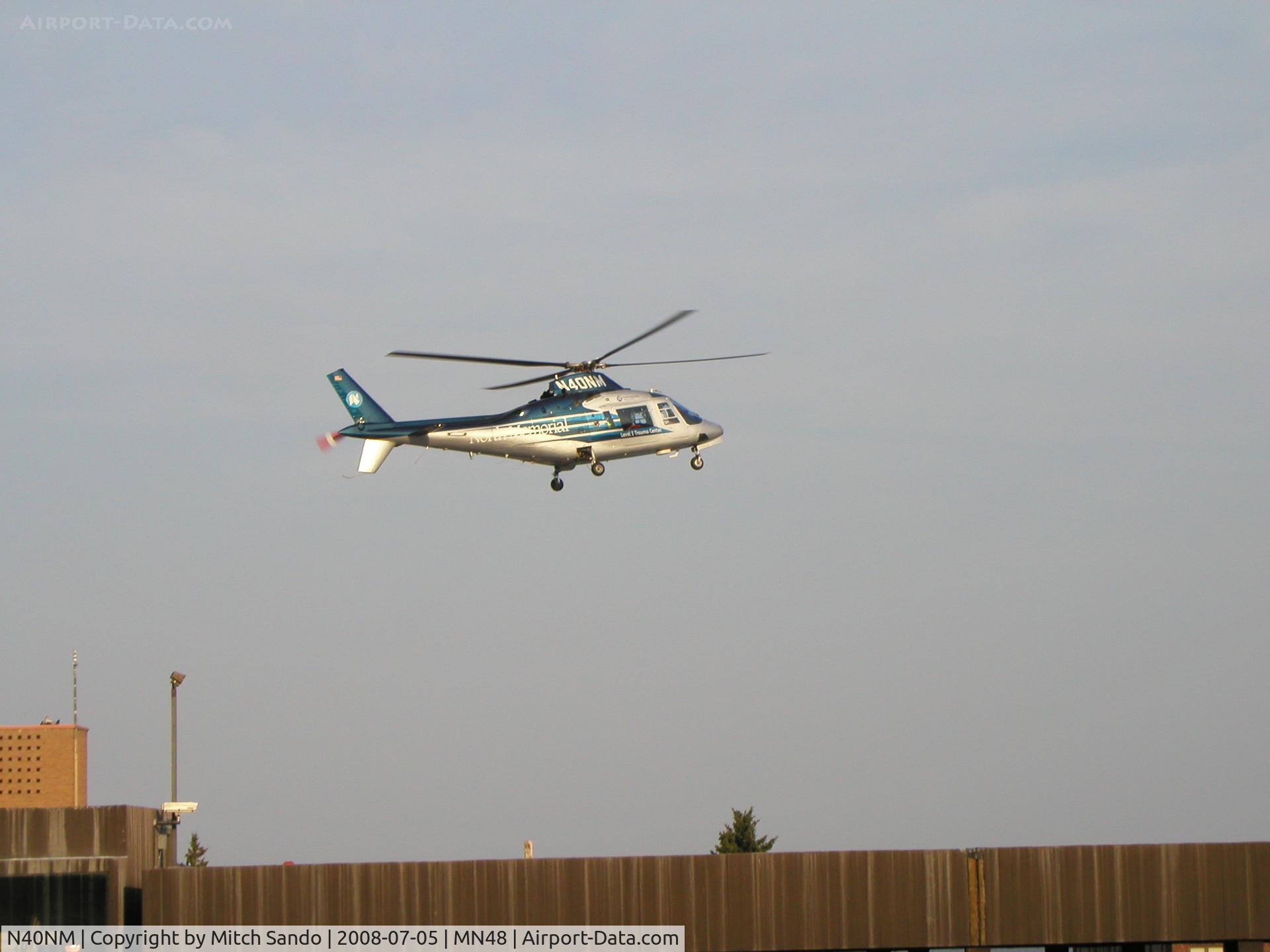 N40NM, 1987 Agusta A109A II C/N 7395, Air Care 5 landing on the parking ramp near the main helipad at St. Luke's in Duluth.