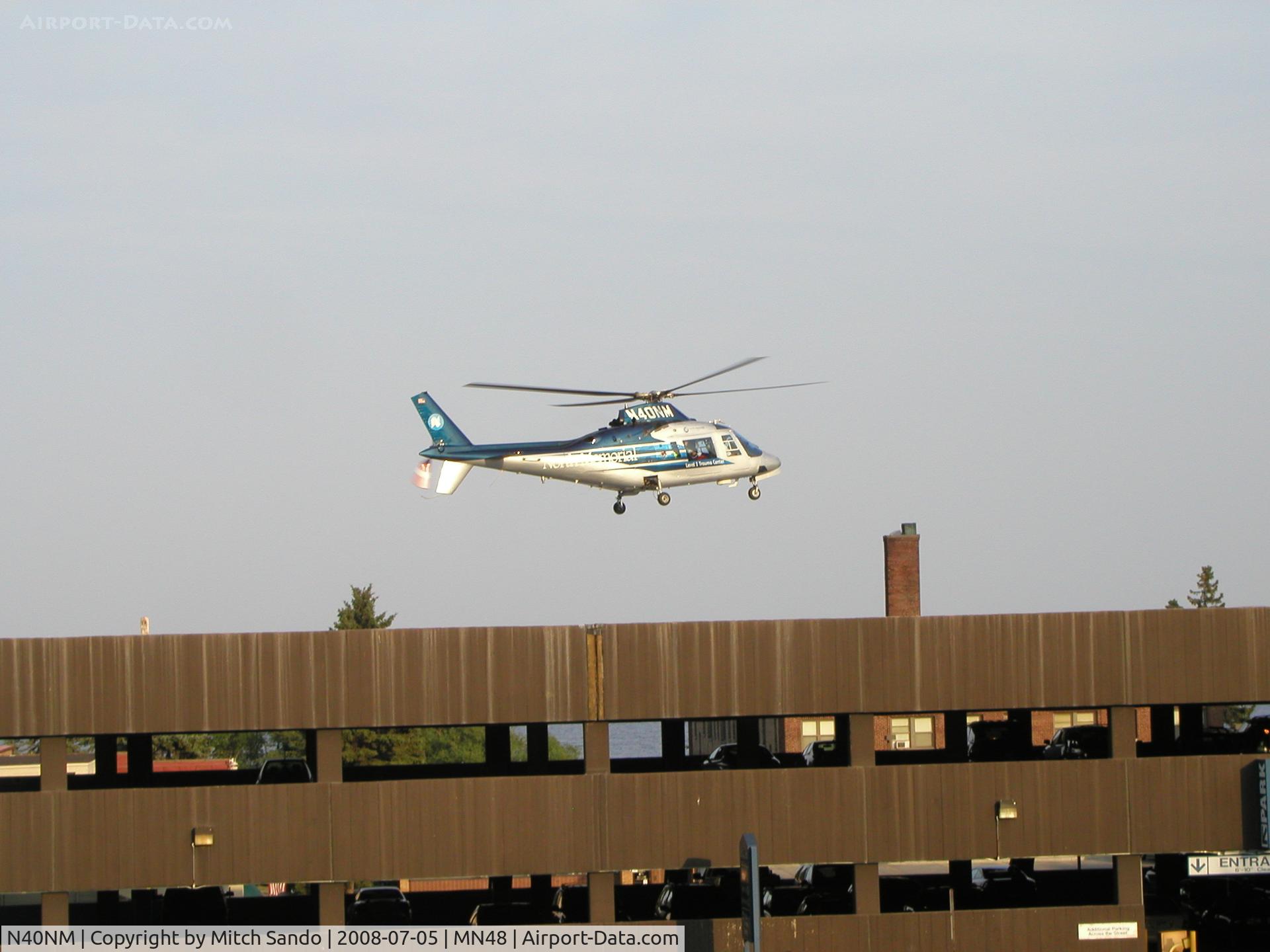 N40NM, 1987 Agusta A109A II C/N 7395, Air Care 5 landing on the parking ramp near the main helipad at St. Luke's in Duluth.