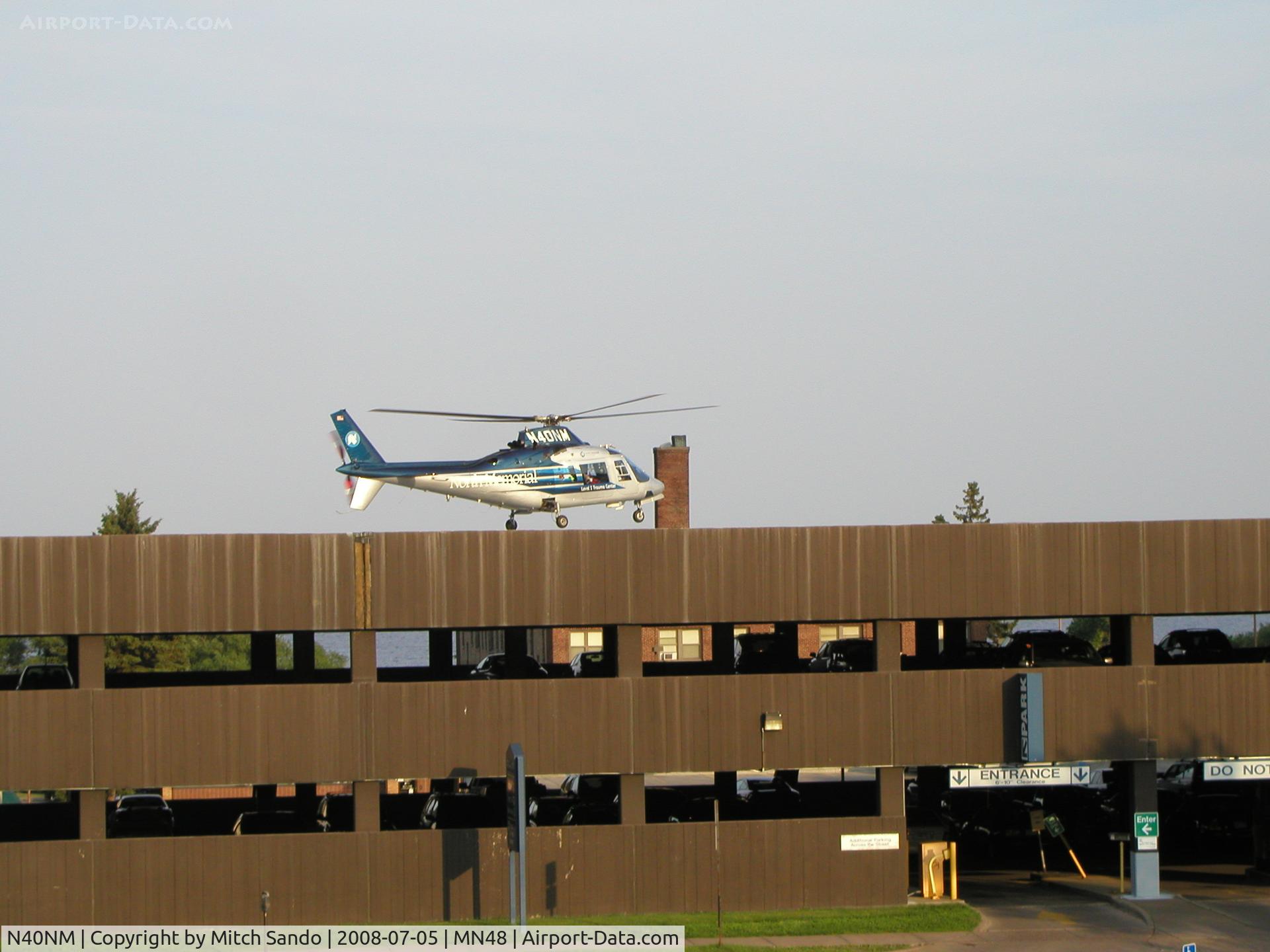 N40NM, 1987 Agusta A109A II C/N 7395, Air Care 5 landing on the parking ramp near the main helipad at St. Luke's in Duluth.